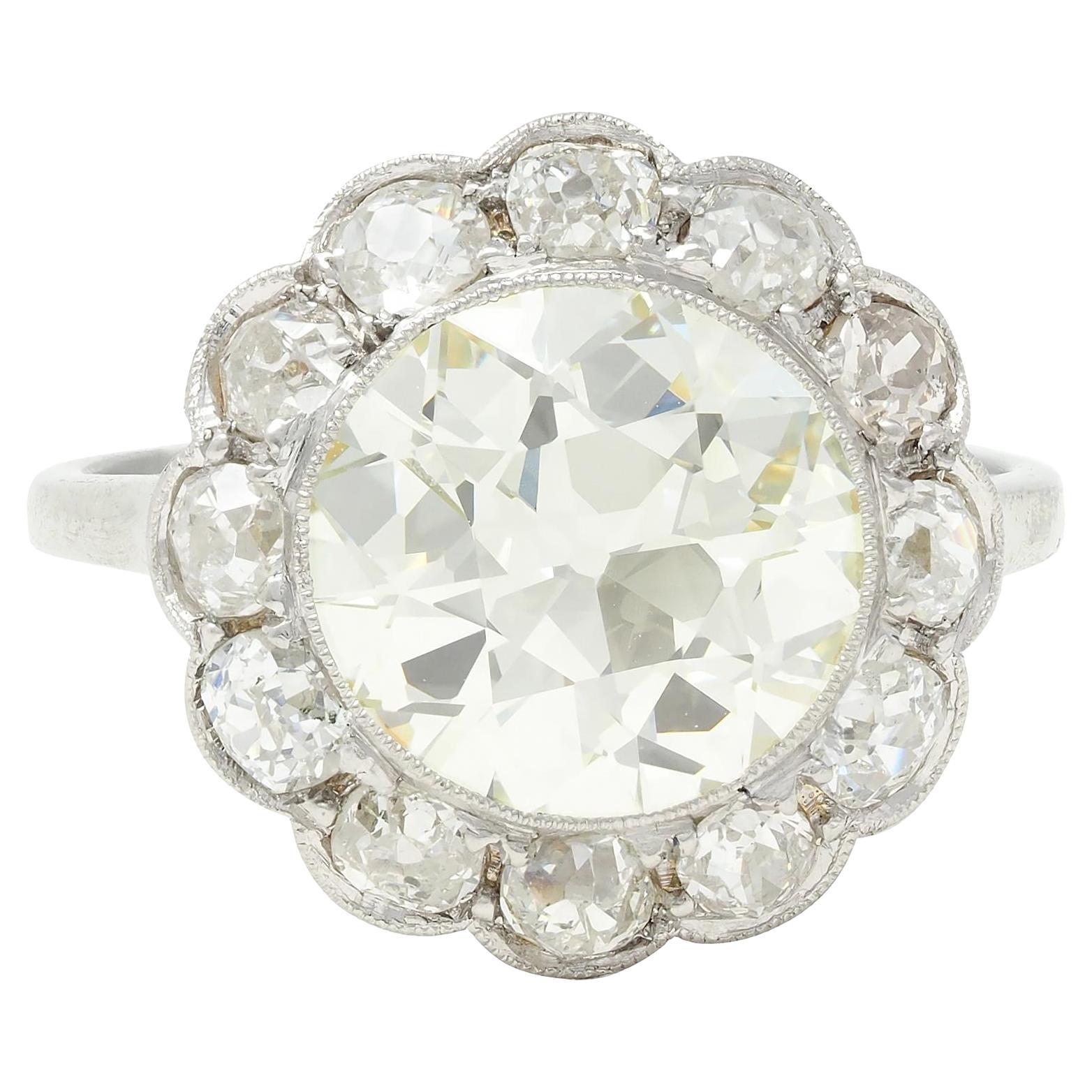 Art Deco 3.99 CTW Old European Cut Diamond 18 Karat White Gold Halo Ring GIA For Sale