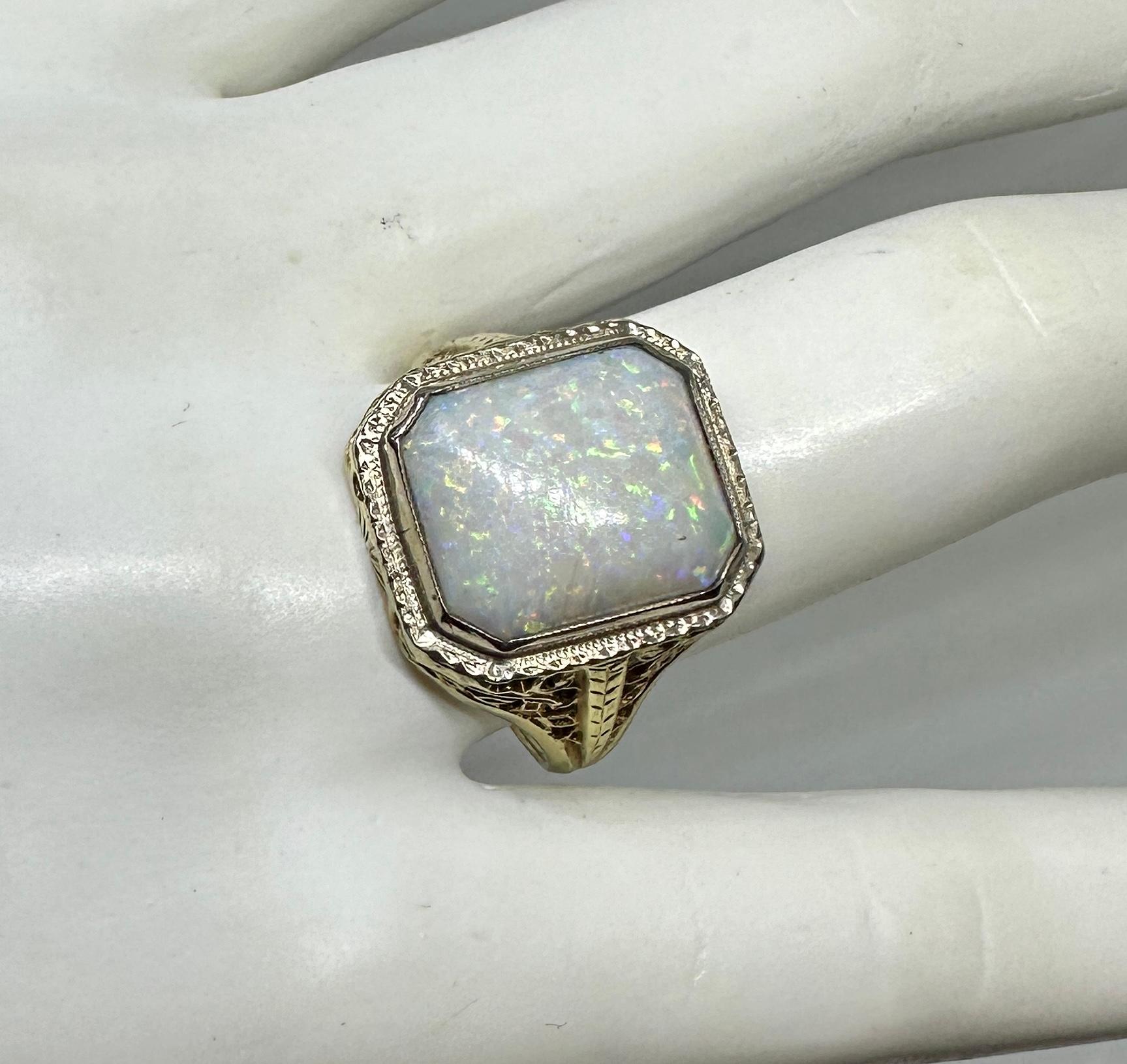Art Deco 4 Carat Opal Ring 14 Karat Gold Hollywood Regency Antique Filigree In Excellent Condition For Sale In New York, NY