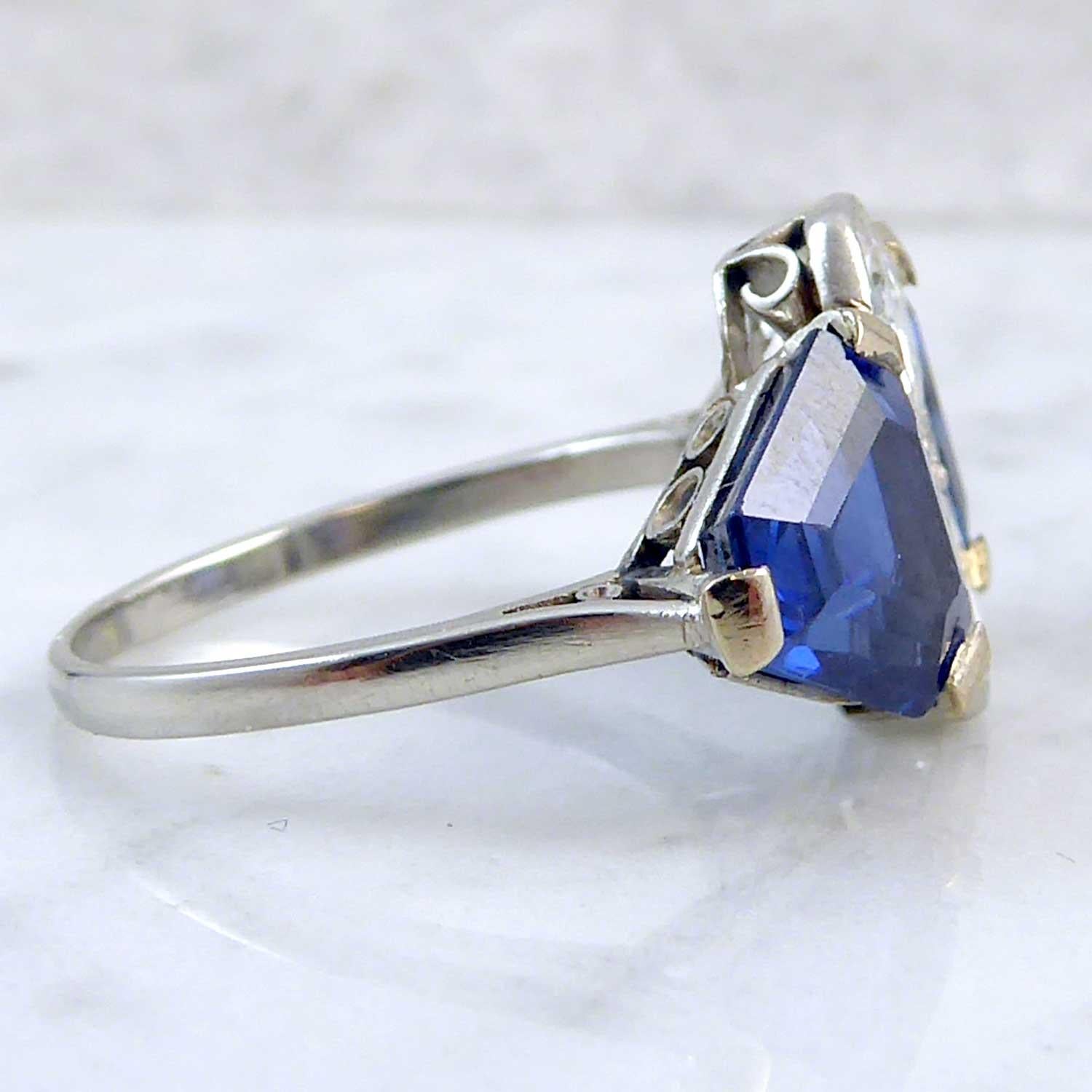 From the Art Deco era circa 1920's, this is a fabulous sapphire and diamond ring in a geometric 