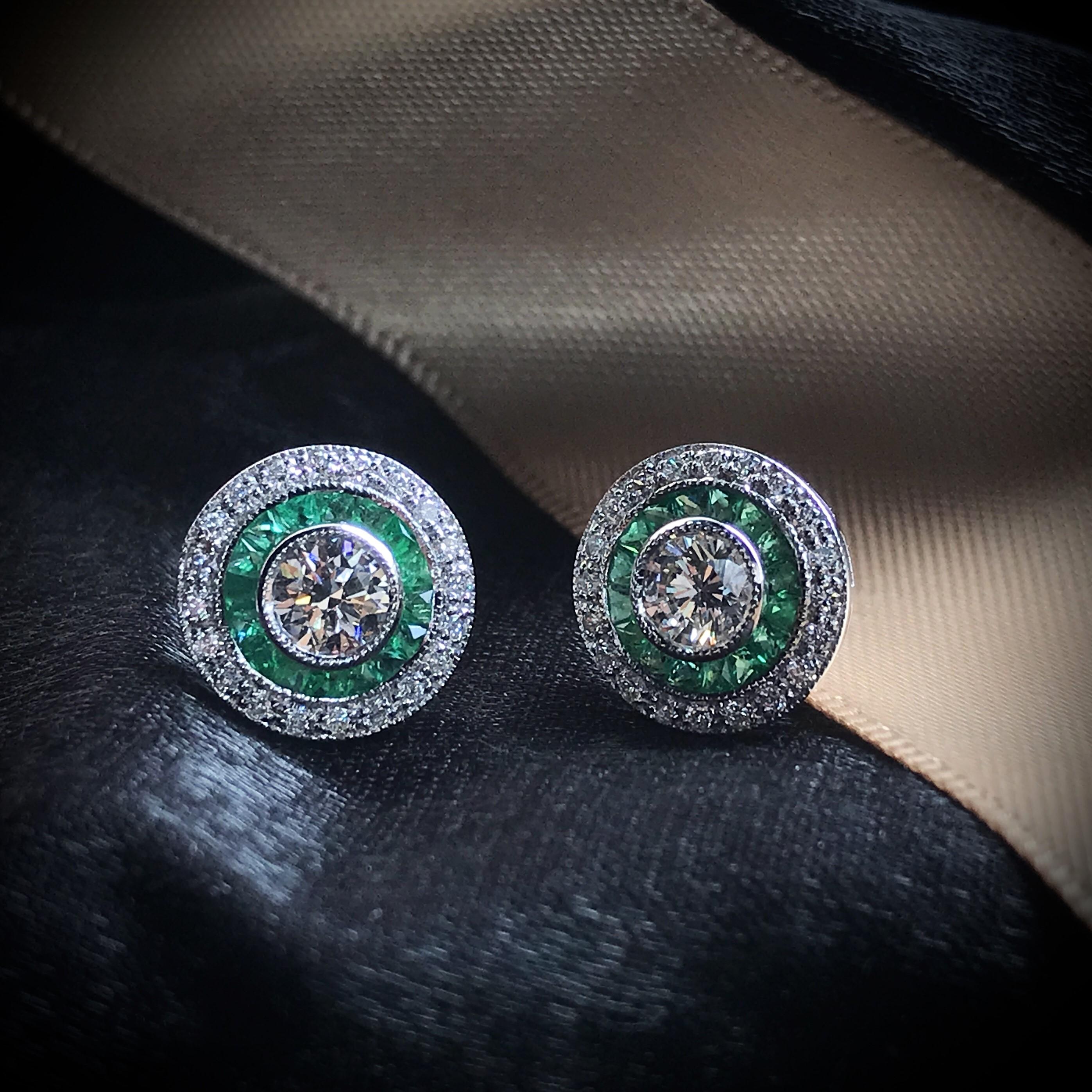 These Art-Deco stud earrings are completely spectacular! The vibrant color stone (you can select Blue Sapphire, Emerald, or Ruby) is a specialty cut to surround the excellent round brilliant cut center diamond, which is in a thin bezel with
