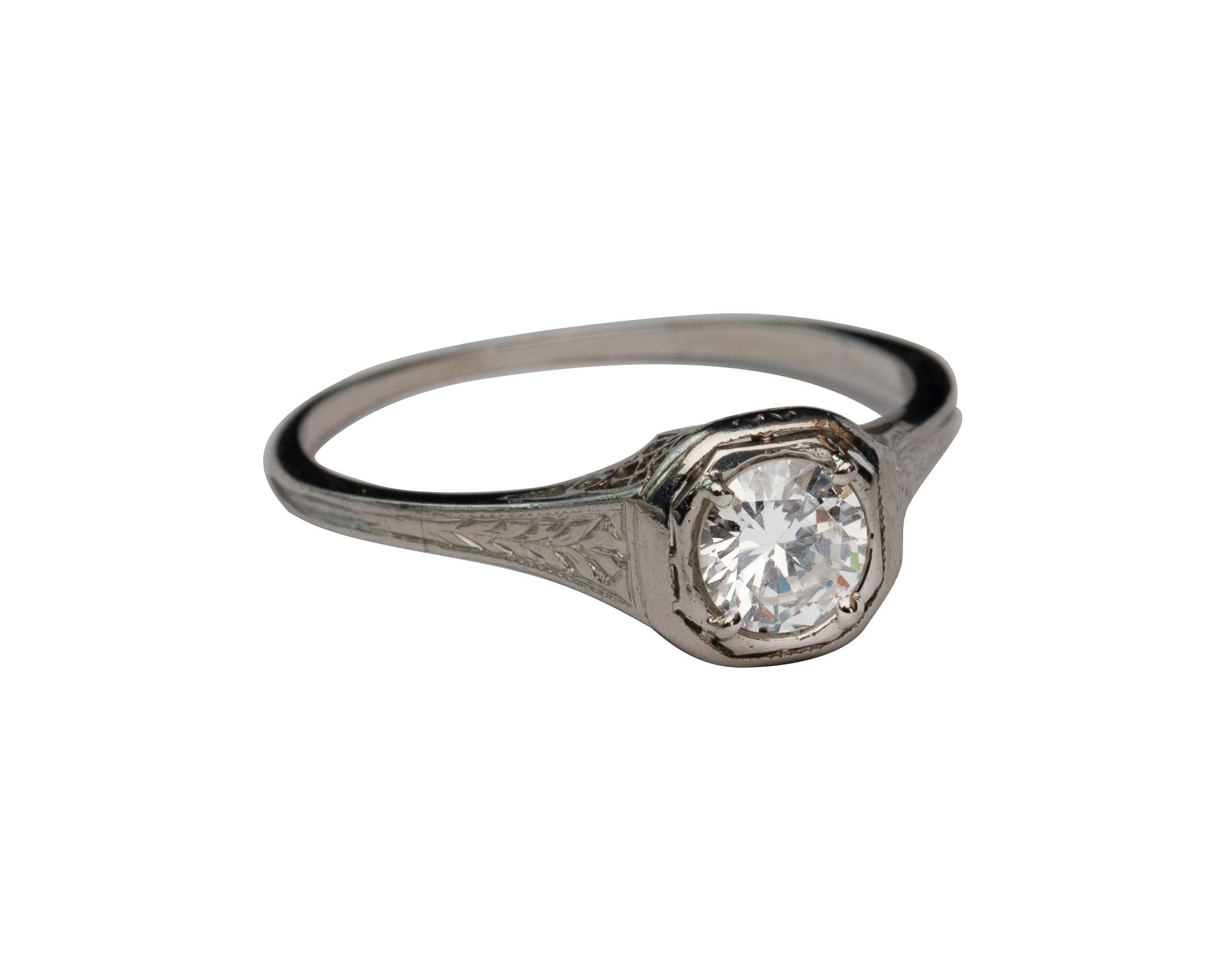 Here we have an amazing example of an Art Deco era engagement ring! This genuine 1930's ring features a bright .44 Carat Old European cut diamond set beautifully in a highly detailed platinum ring. The beautifully crafted platinum ring is decorated