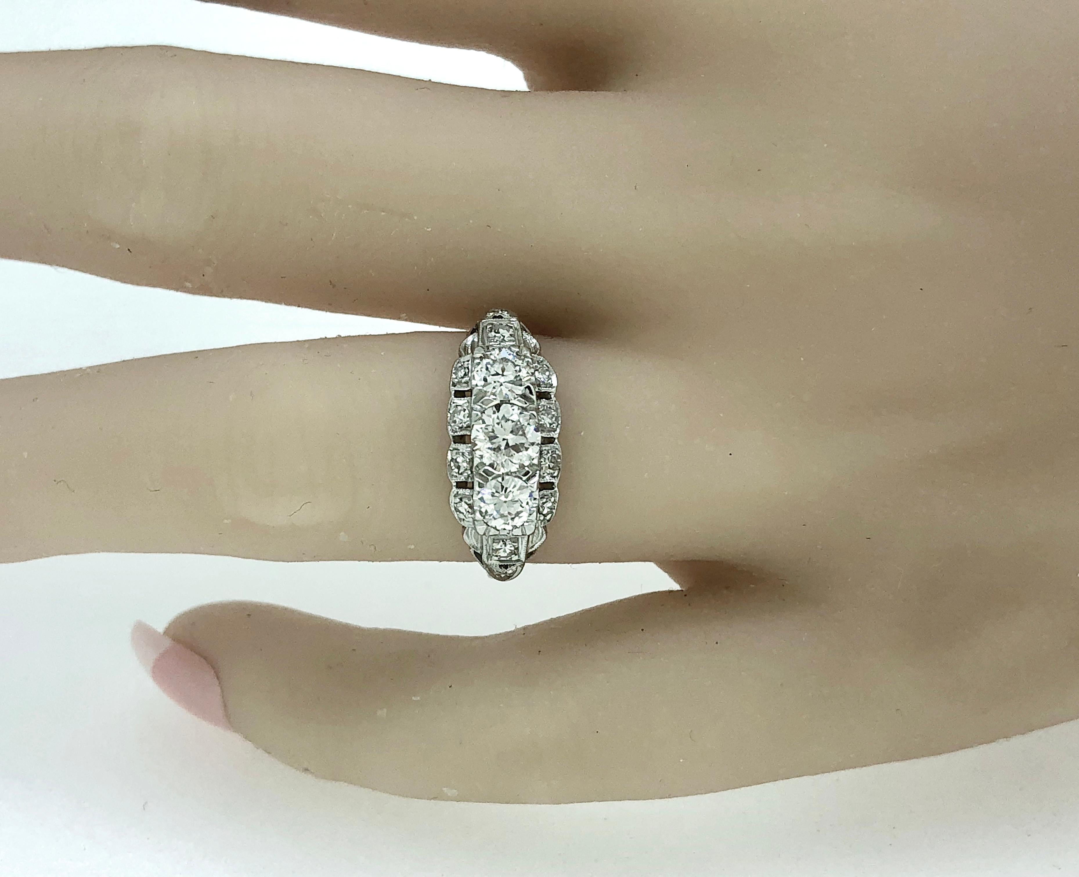 Women's or Men's Art Deco .45 Carat Diamond Platinum Three Stone Ring