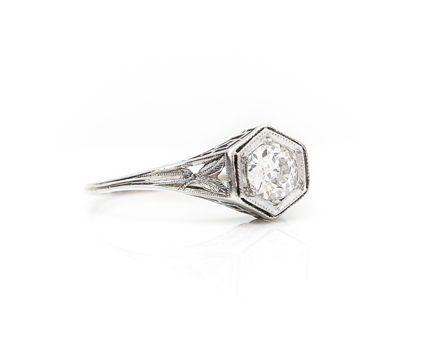 Description: 

Simple elegance defines this Art Deco beauty! Symmetrically pierced filigree head houses a .45 carat Old European cut diamond that exhibits flustering brilliance. The intricate mounting is in fantastic condition and is sure to dazzle