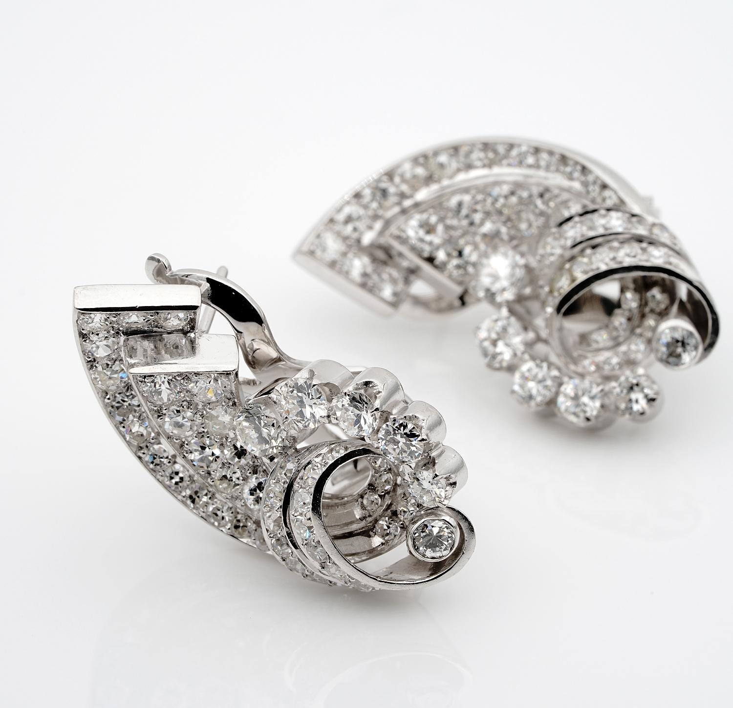 Impressive Deco!

Cornucopias together with fabulous bows were a MUST during the Deco era, brooches earrings were to impress loaded with Diamonds and sometimes with coloured gemstones complement
These truly terrific pair of the Deco era are clip on