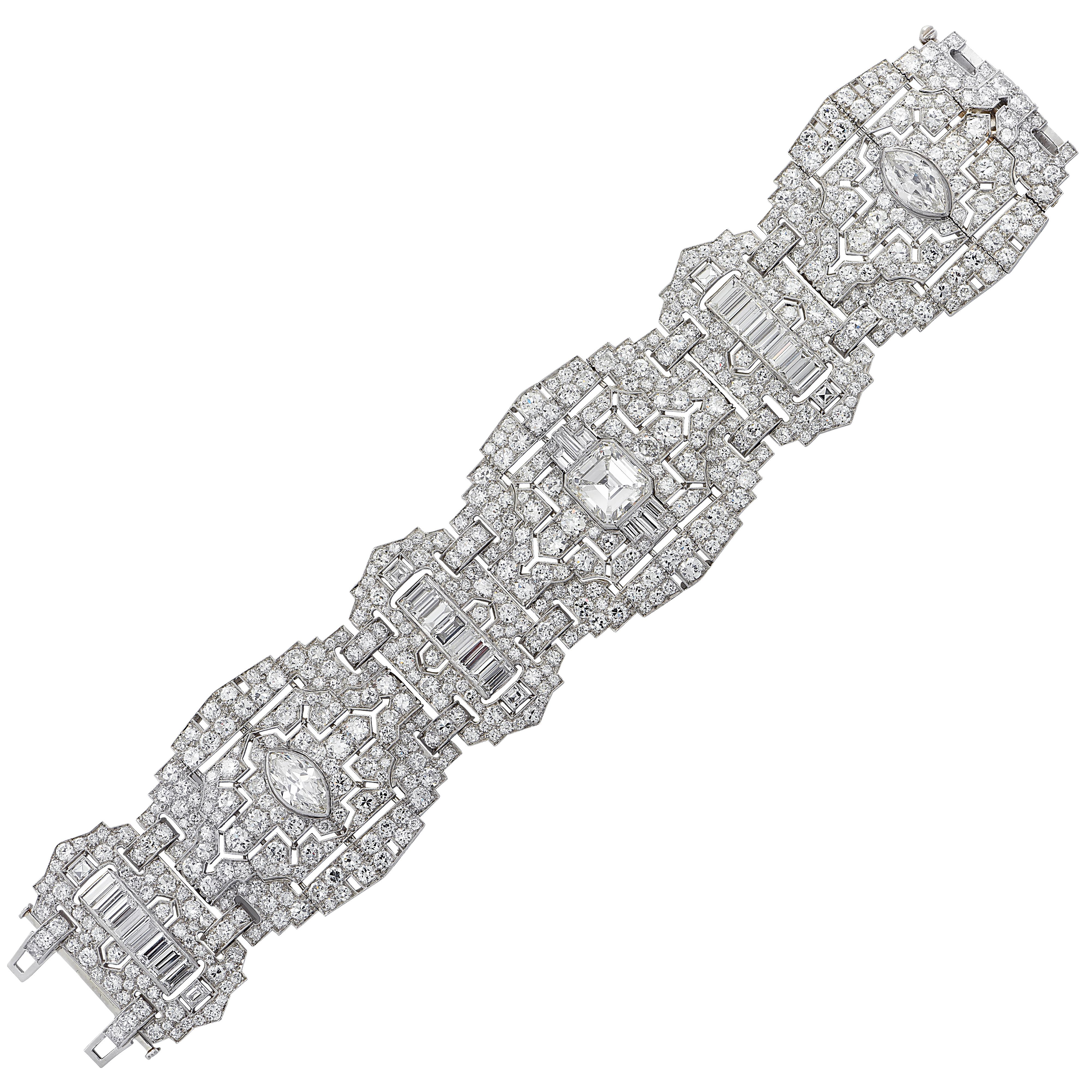 Breathtakingly beautiful Art Deco diamond bracelet finely crafted in platinum, showcasing 588 mixed cut diamonds weighing approximately 47 carats total. This spectacular bracelet showcases an emerald cut diamond weighing approximately 4 carats, J