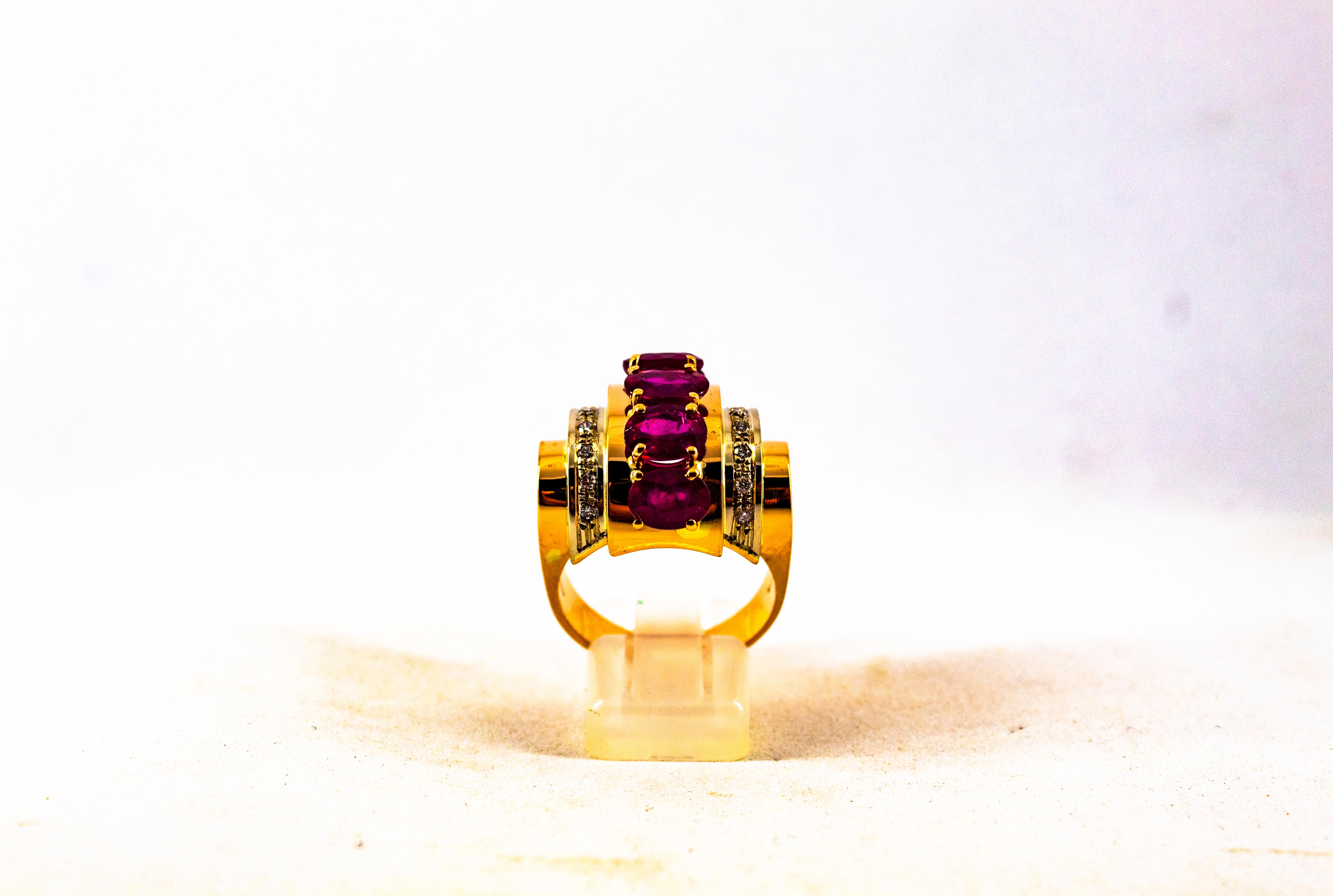 This Ring is made of 14K Yellow Gold.
This Ring has 0.30 Carats of White Modern Round Cut Diamonds.
This Ring has 5.00 Carats of Oval Cut Rubies.
This Ring is available also with Emeralds or Blue Sapphires.
Size ITA: 19 USA: 8 3/4
We're a workshop