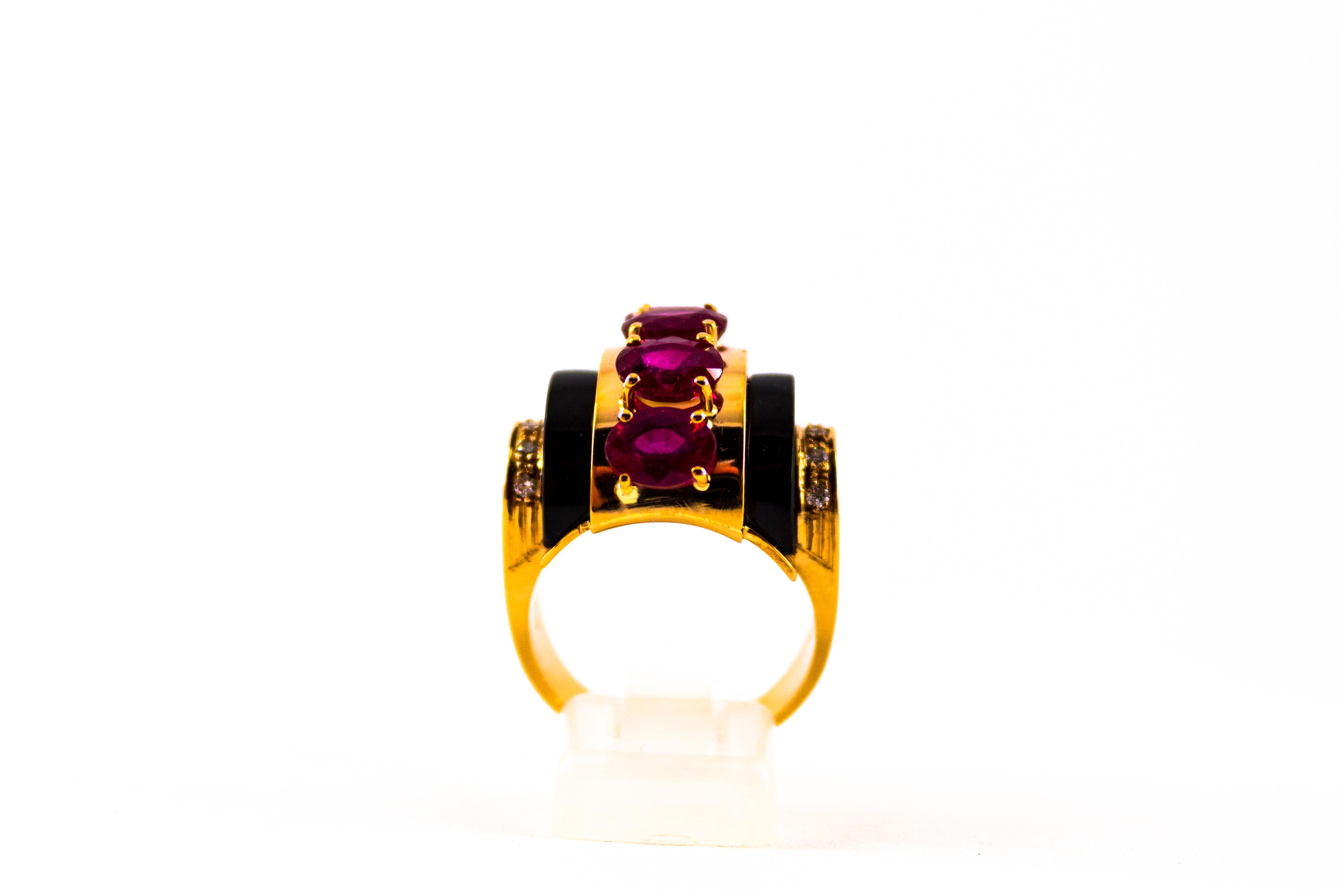 This Ring is made of 14K Yellow Gold.
This Ring has 0.15 Carats of White Diamonds.
This Ring has 5.10 Carats of Rubies.
This Ring has Onyx.
This Ring is available also with Emeralds.
Size ITA: 20 USA: 9 1/4
We're a workshop so every piece is