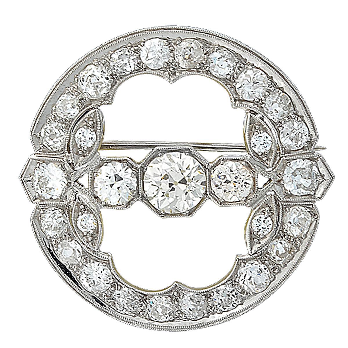 Platinum Art Deco Brooch Set with 29 Old European Cut Diamonds Weighing Approximately 5.35 Carats, H Color, VS Clarity. The Center Diamond is Approximately 1.15 Carat.