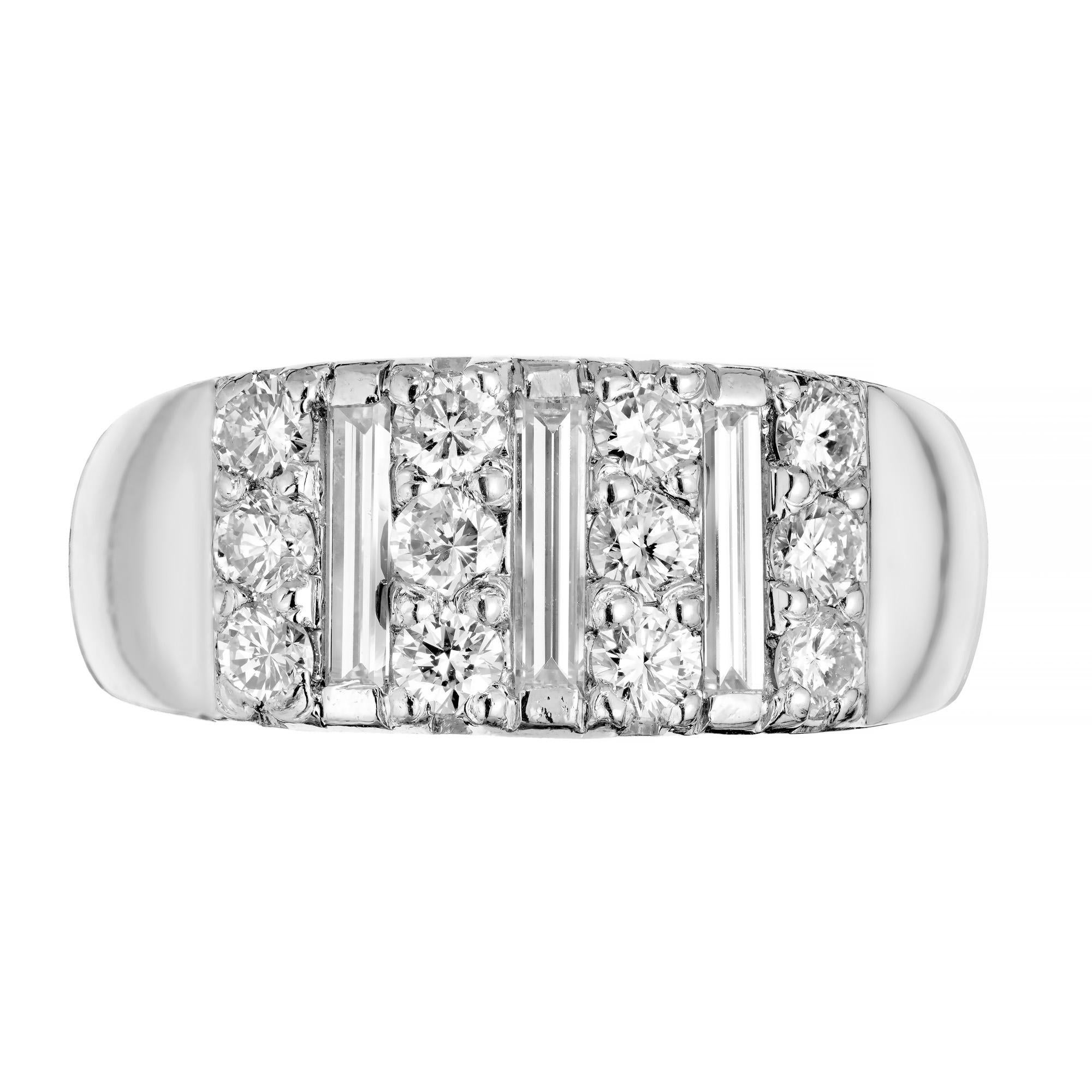 1940's Vintage late Art Deco diamond band ring. 12 full cut diamonds in four rows of three separated by three baguette cut diamonds, set in a platinum mounting. 

3 baguette cut diamonds, .10cts each, F, VS, approx. total weight .30cts
12 full cut