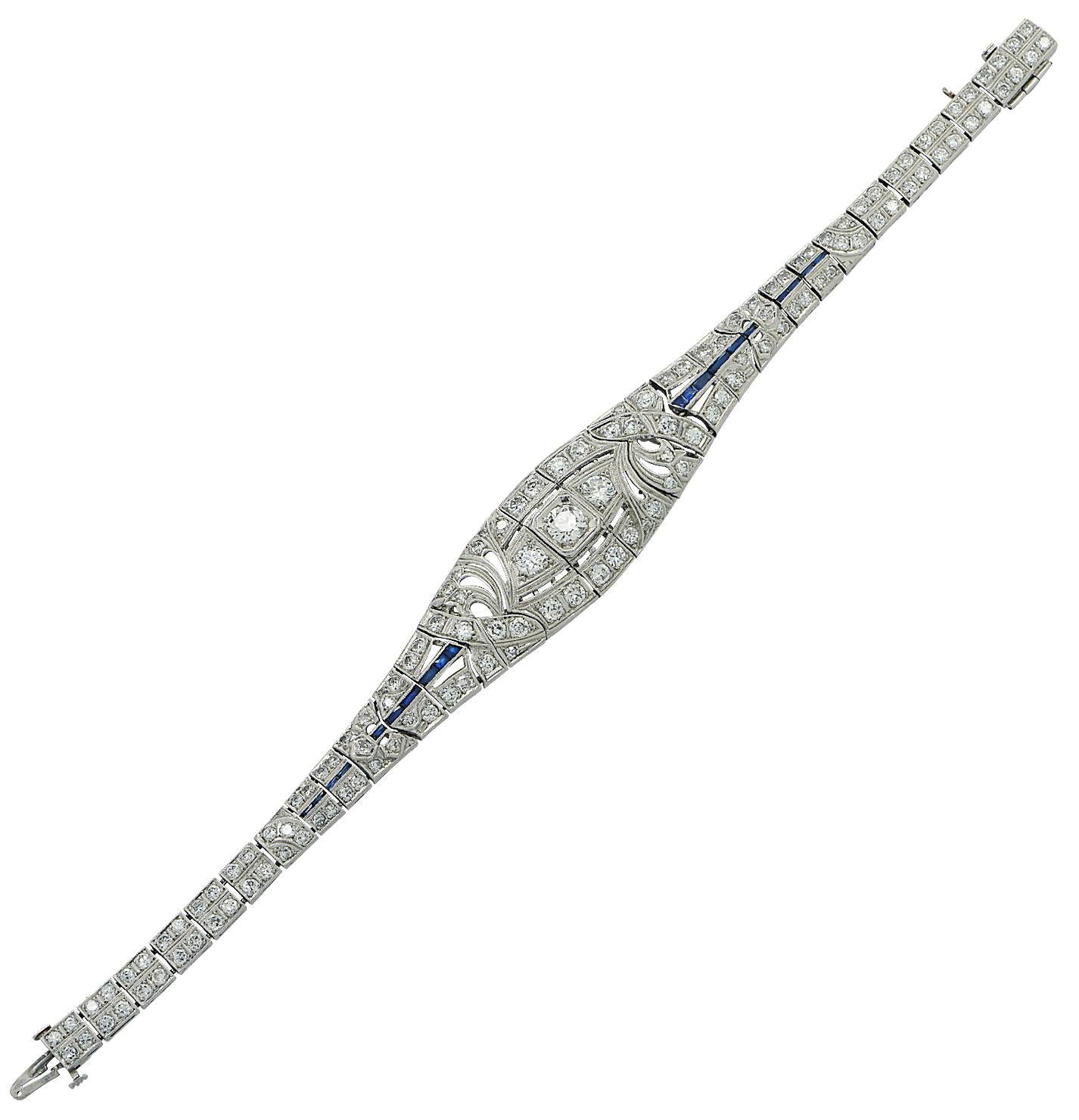 Magnificent art deco bracelet, crafted in platinum, Featuring 197 Old European cut diamonds weighing approximately 5.44 carats total, E-H color, VS-SI clarity. This beautiful bracelet is designed in an antique pattern of lines, a milgrain border,