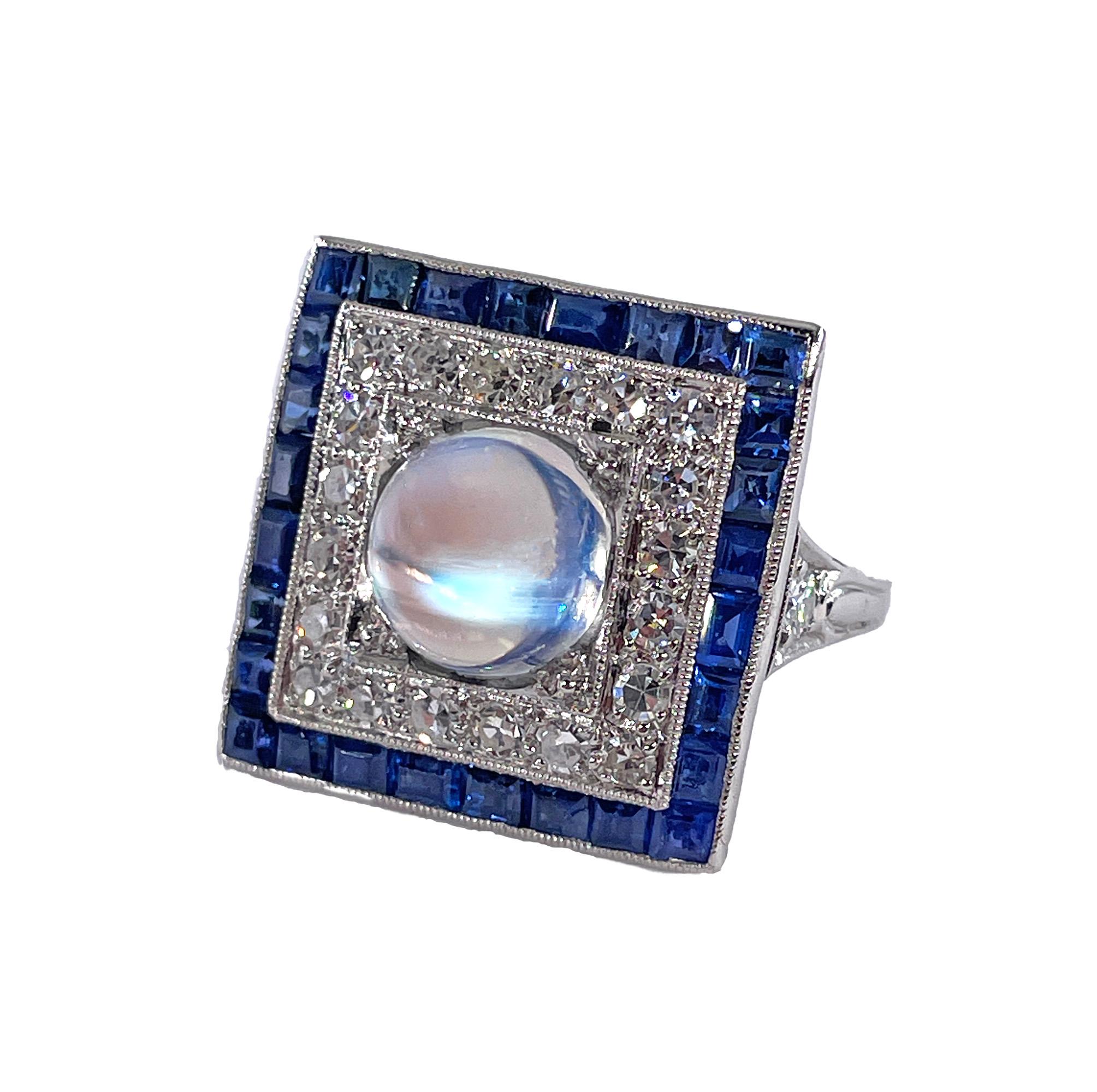 1920s Antique Dazzling Art Deco 5.54ctw Blue Moonstone Diamond Sapphire Platinum Dinner Ring

The finest examples of Art Deco engagement rings were hand fabricated and impeccably finished with hand tooled engraving . No expense was spared in