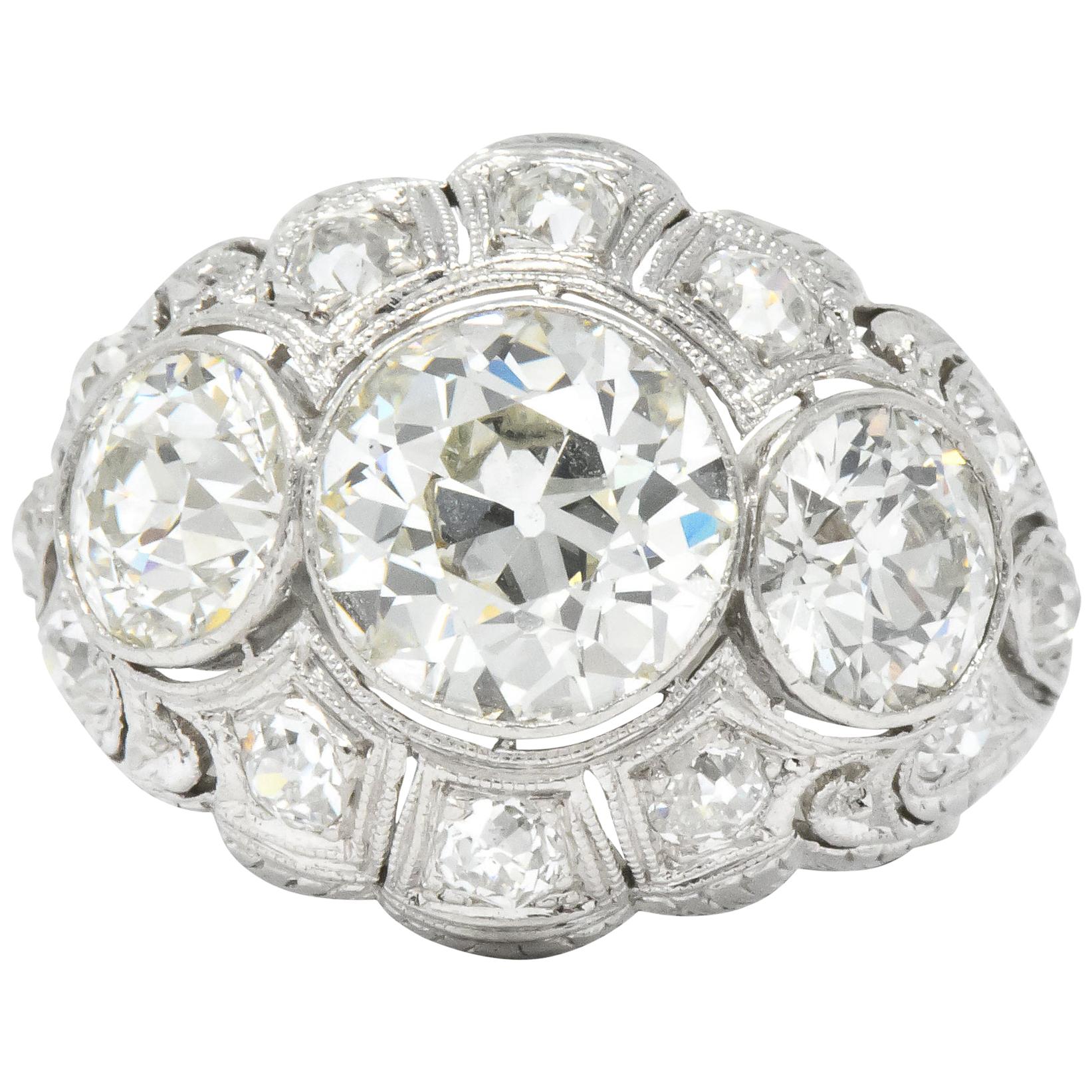 Art Deco 5.60 Carat Old European Diamond Platinum Three Stone Ring