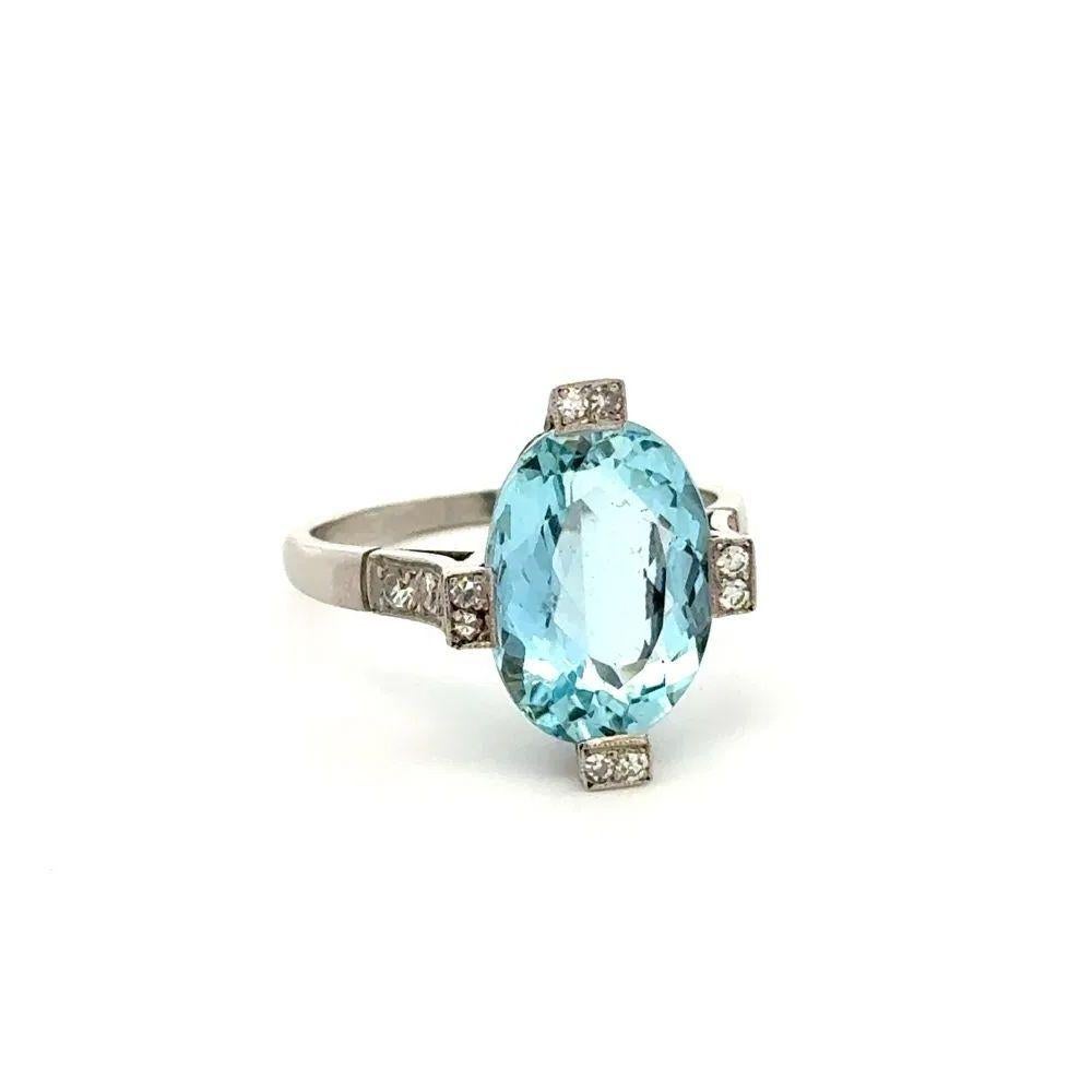 Simply Beautiful! Art Deco Aquamarine and Diamond Platinum Vintage Statement Ring. Centering a securely Hand set Aquamarine, weighing approx. 5.70 Carat. Accented with Hand set .34tcw Diamonds. Finely Hand-crafted Platinum mounting. Ring size 6.75,