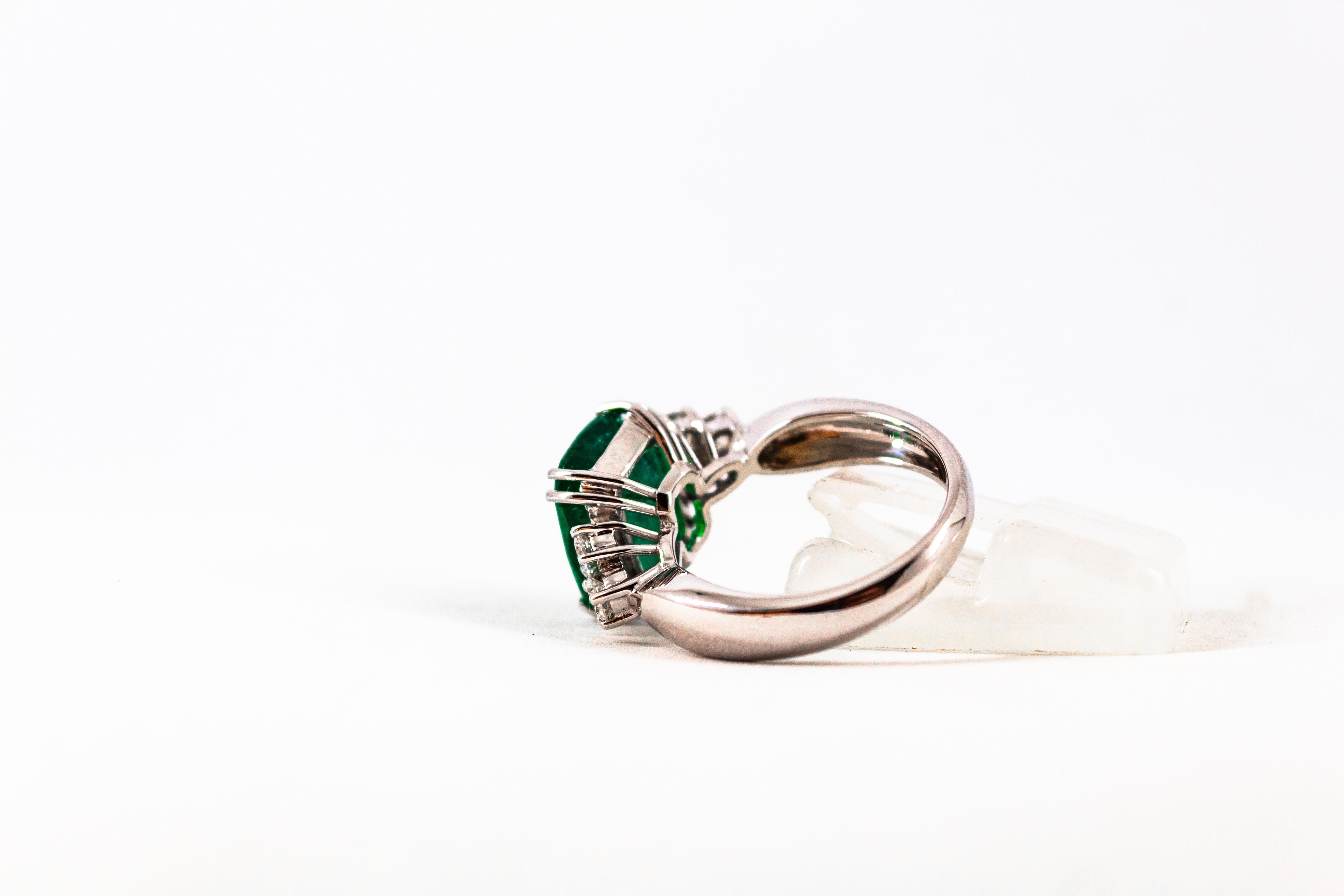 Art Deco 5.73 Carat Emerald 0.74 Carat White Diamond White Gold Cocktail Ring 10