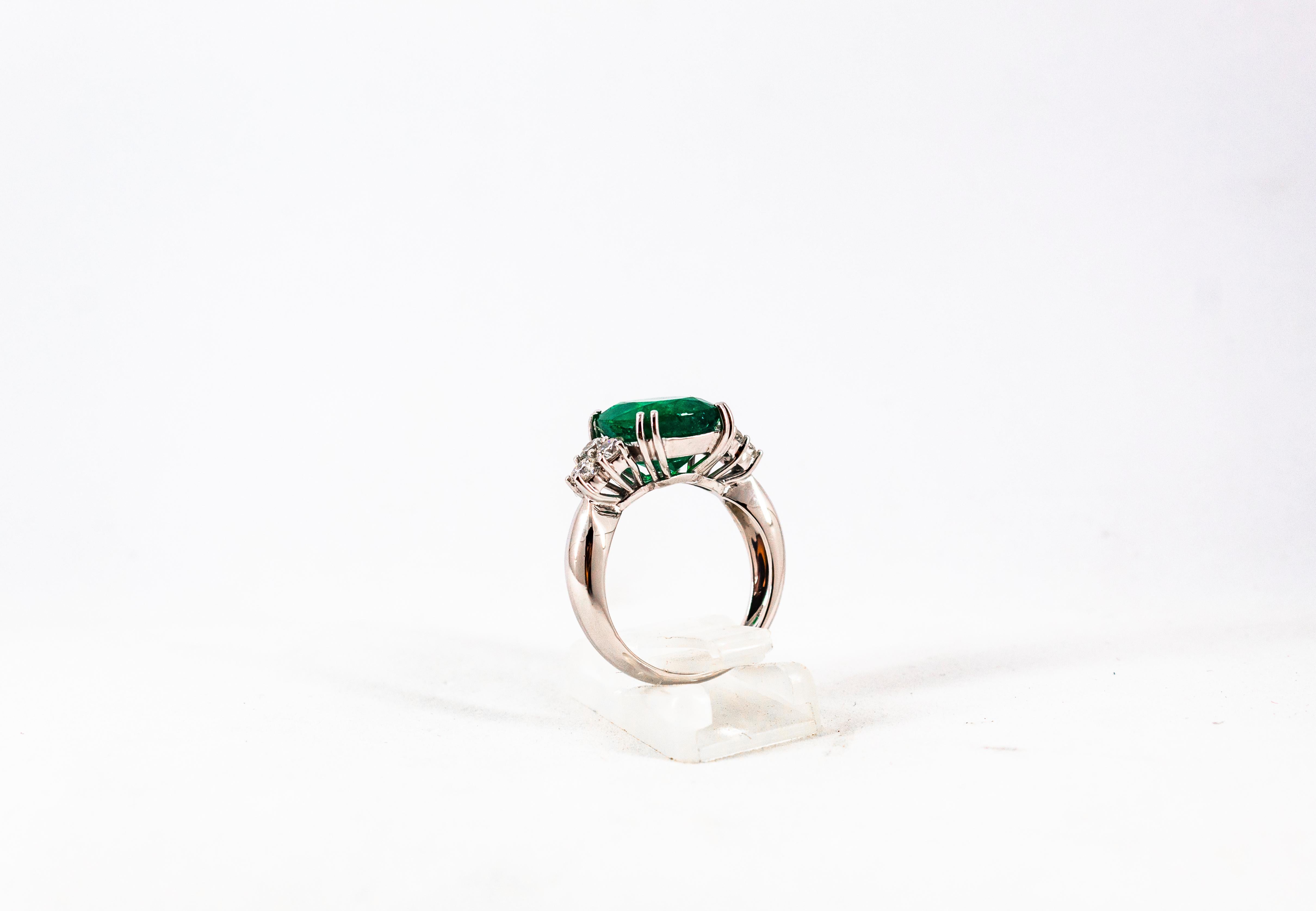 Women's or Men's Art Deco 5.73 Carat Emerald 0.74 Carat White Diamond White Gold Cocktail Ring