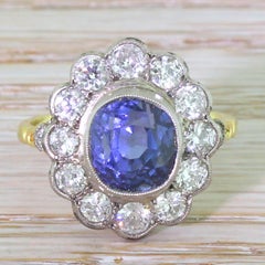 Art Deco 5.76 Carat Natural Ceylon Sapphire and Old Cut Diamond Cluster Ring