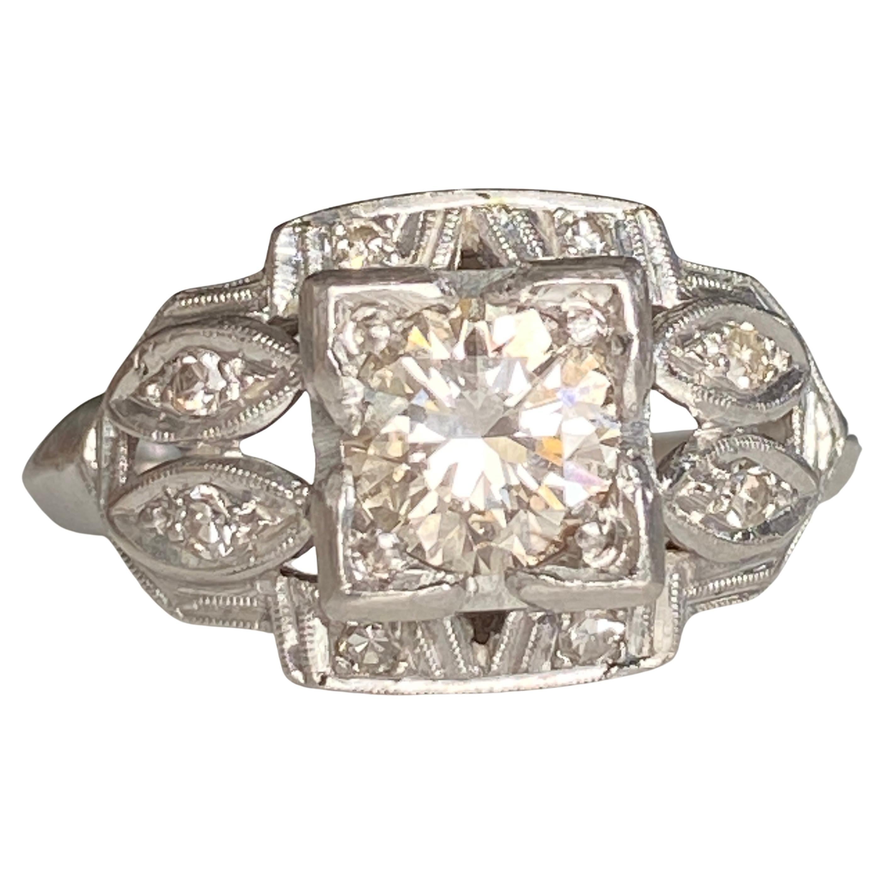 Art Deco .57ct Diamond Platinum Engagement Ring For Sale