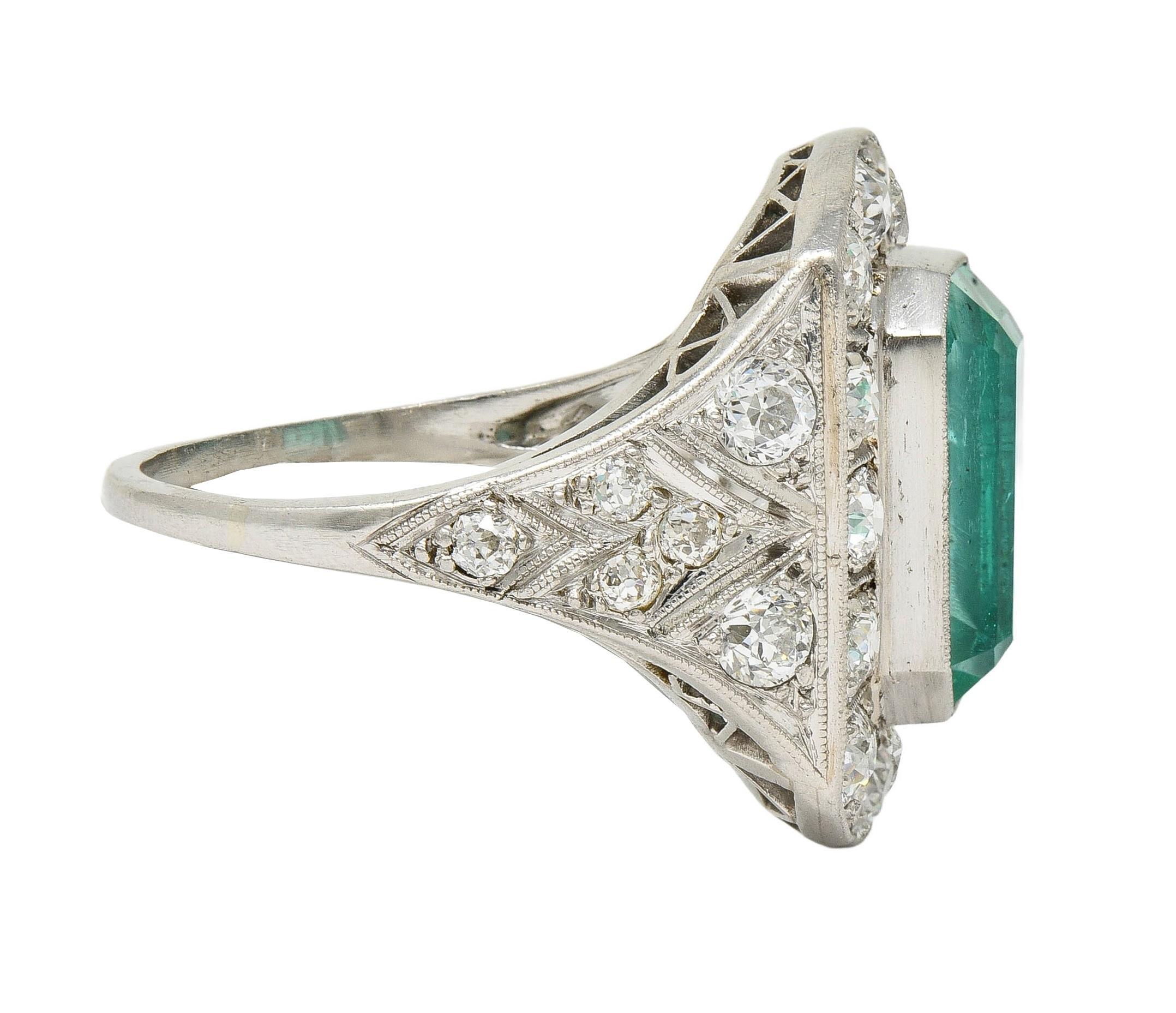 Women's or Men's Art Deco 5.86 CTW Colombian Emerald Diamond Platinum Vintage Halo Ring GIA For Sale