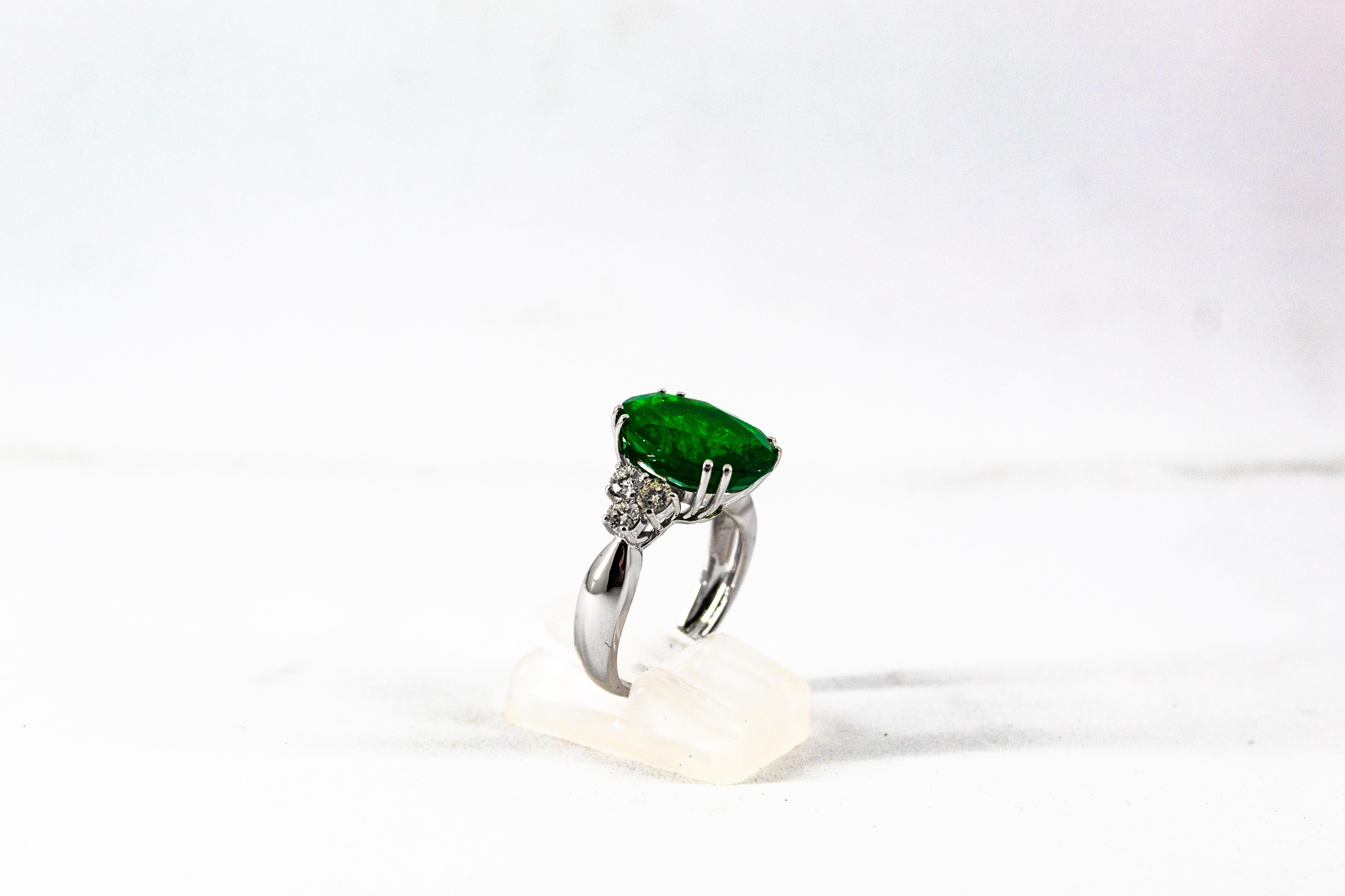 Women's or Men's Art Deco 6.42 Carat Emerald 0.60 Carat White Diamond White Gold Cocktail Ring For Sale