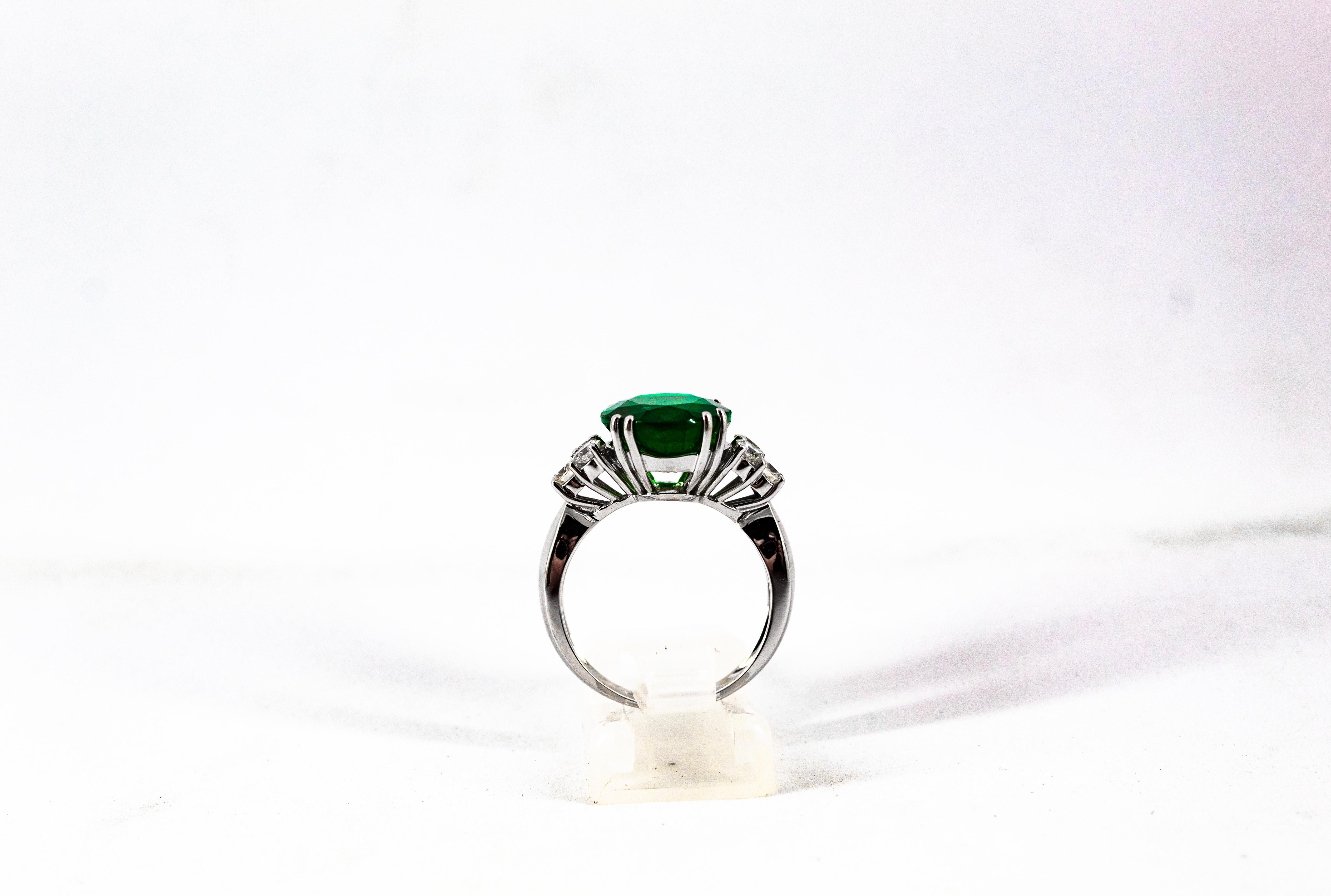 Art Deco 6.42 Carat Emerald 0.60 Carat White Diamond White Gold Cocktail Ring For Sale 2