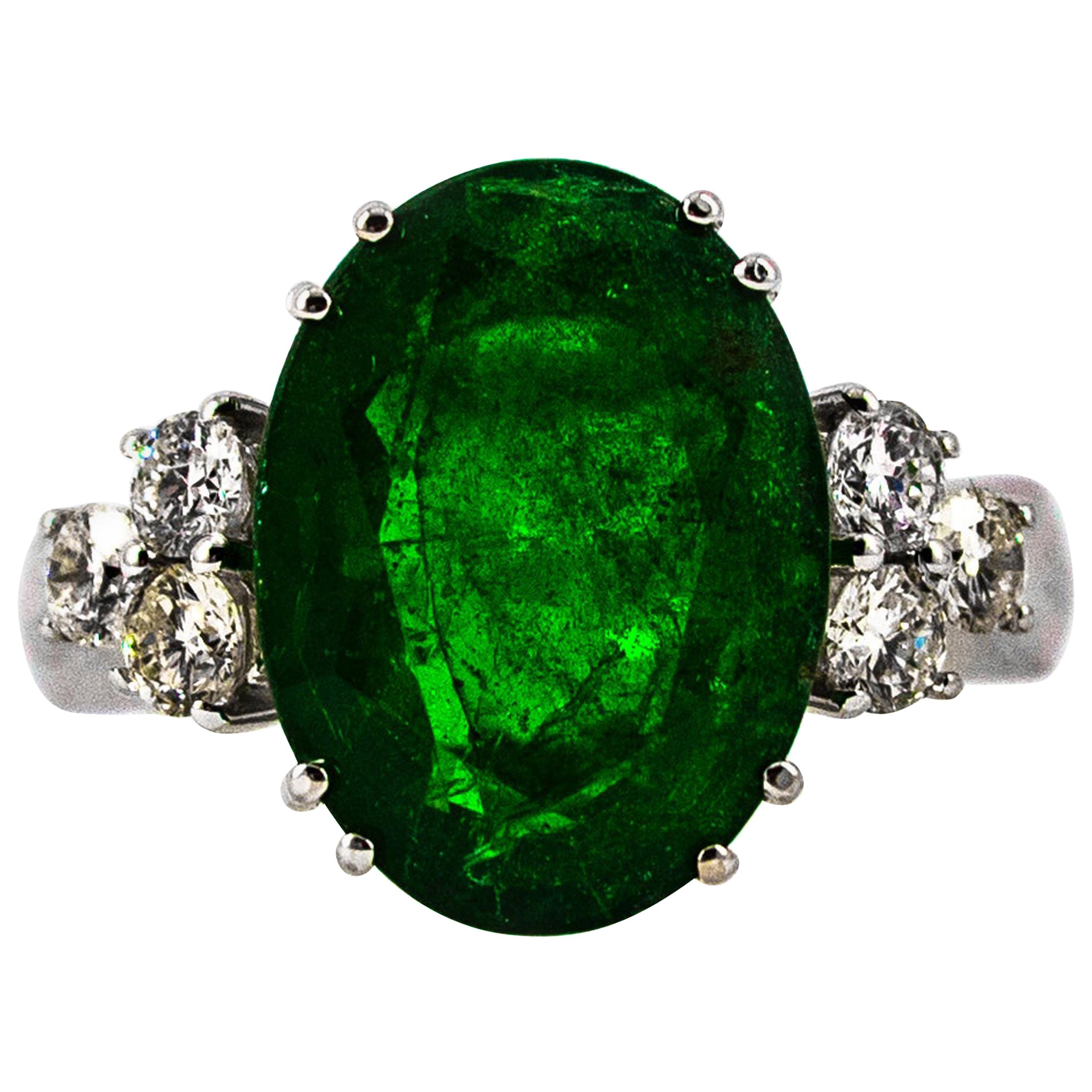 Art Deco 6.42 Carat Emerald 0.60 Carat White Diamond White Gold Cocktail Ring For Sale