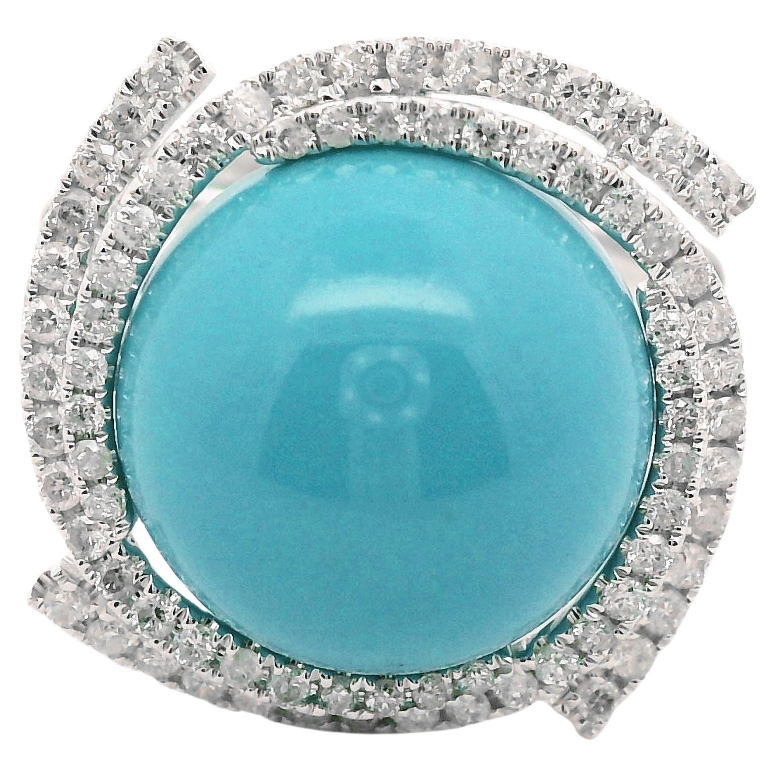 This stunning 14K White Gold Ring showcases the beauty of Sleeping Beauty Turquoise, featuring a 6.46-carat cabochon centerpiece, radiating a rich blue color that evokes the serene essence of the Sleeping Beauty mines. The turquoise is surrounded by