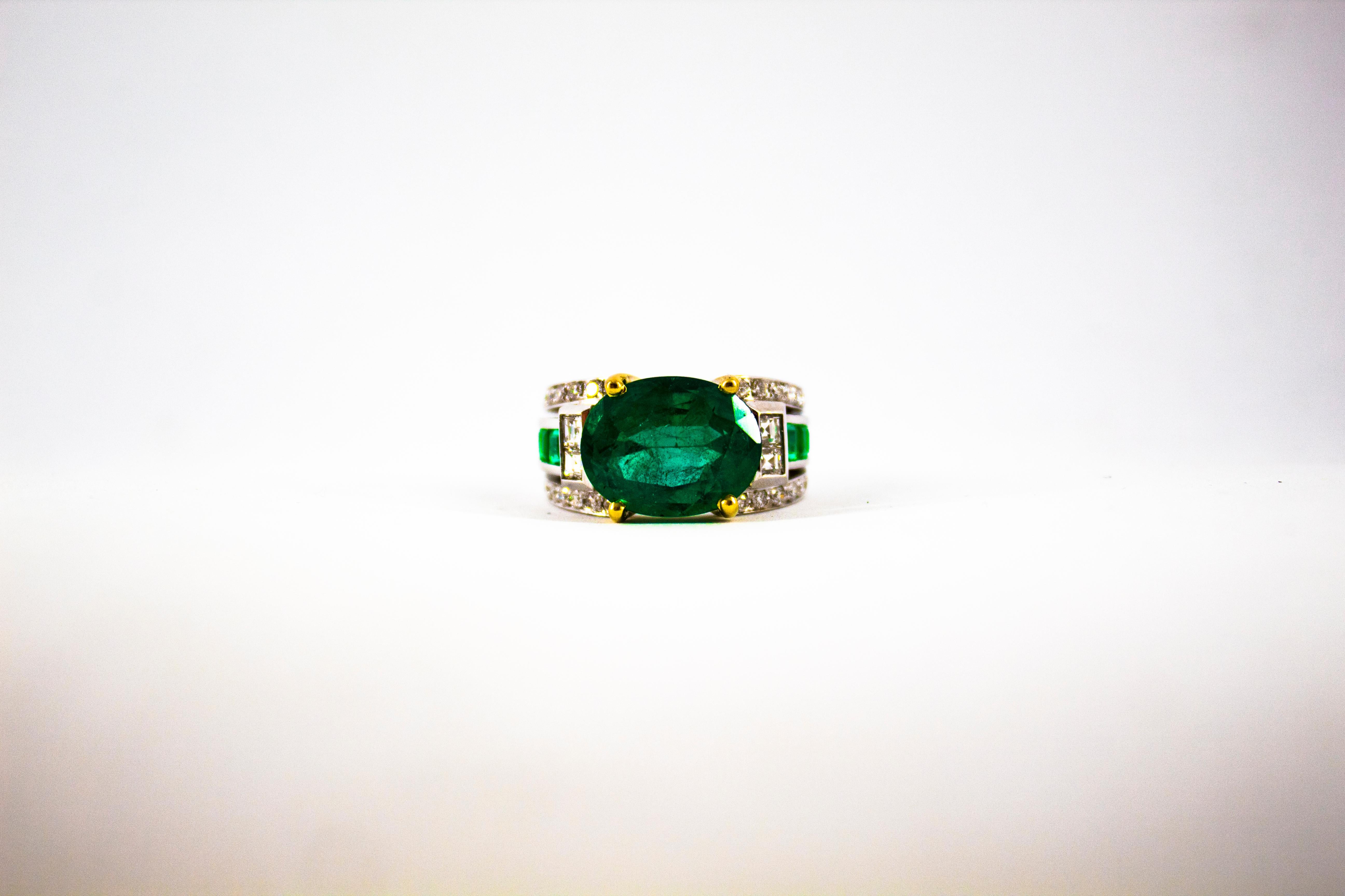 Art Deco 6.93 Carat Emerald 0.82 Carat White Diamond White Gold Cocktail Ring 9