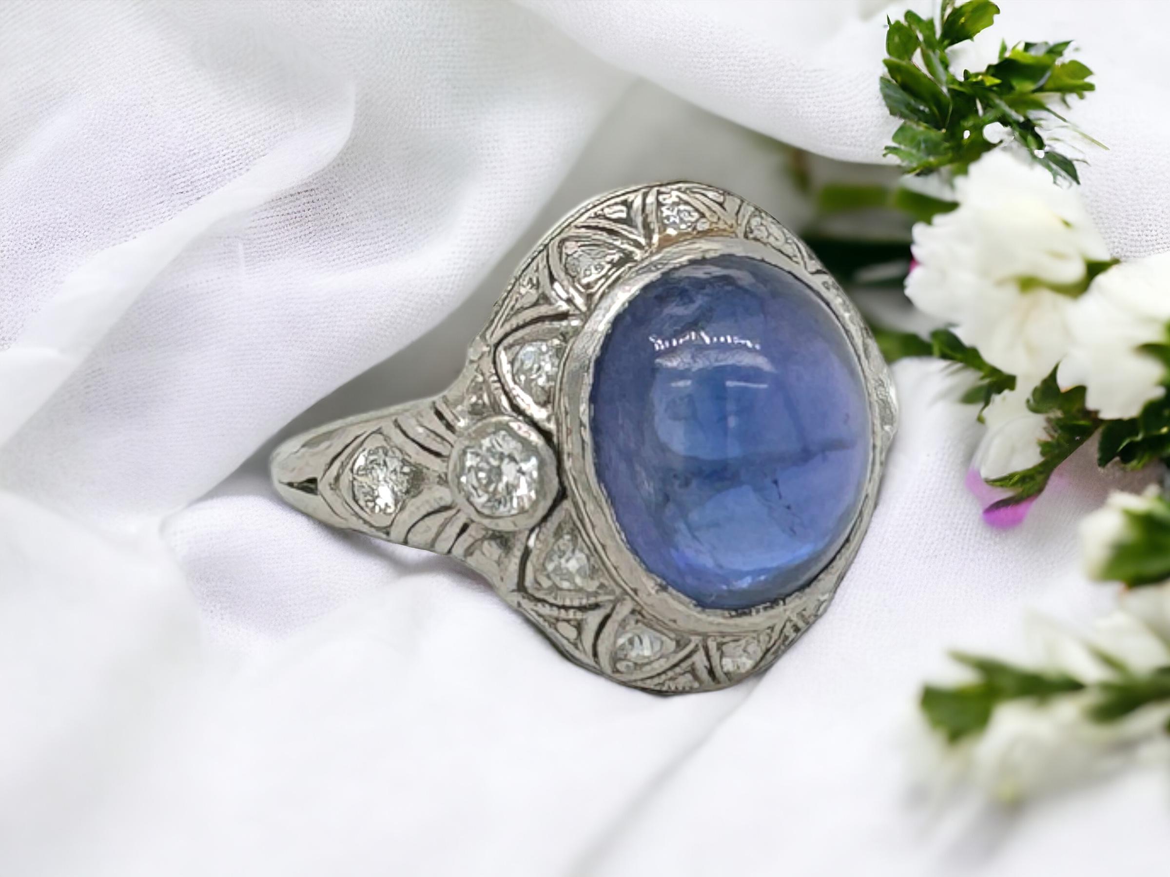 This is one of the most unique & magical pieces currently in our collection!
The center stone is a rare natural color change sapphire. 
This natural phenomenon is caused by trace elements inside the stone.
When exposed to natural daylight or