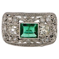Art Deco .70 Ct Colombian Emerald . 75 Ct. Diamond Platinum ring