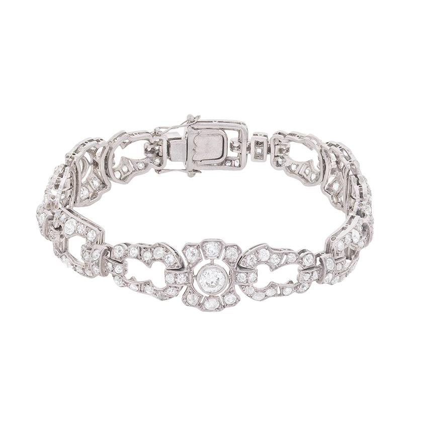 A fabulous late Art Deco period diamond and platinum bracelet! Seven opulent carats of old cut diamonds radiate full circle in this handmade bracelet hailing from the heyday of one of design’s most sought after eras.

This original 1930s bracelet is
