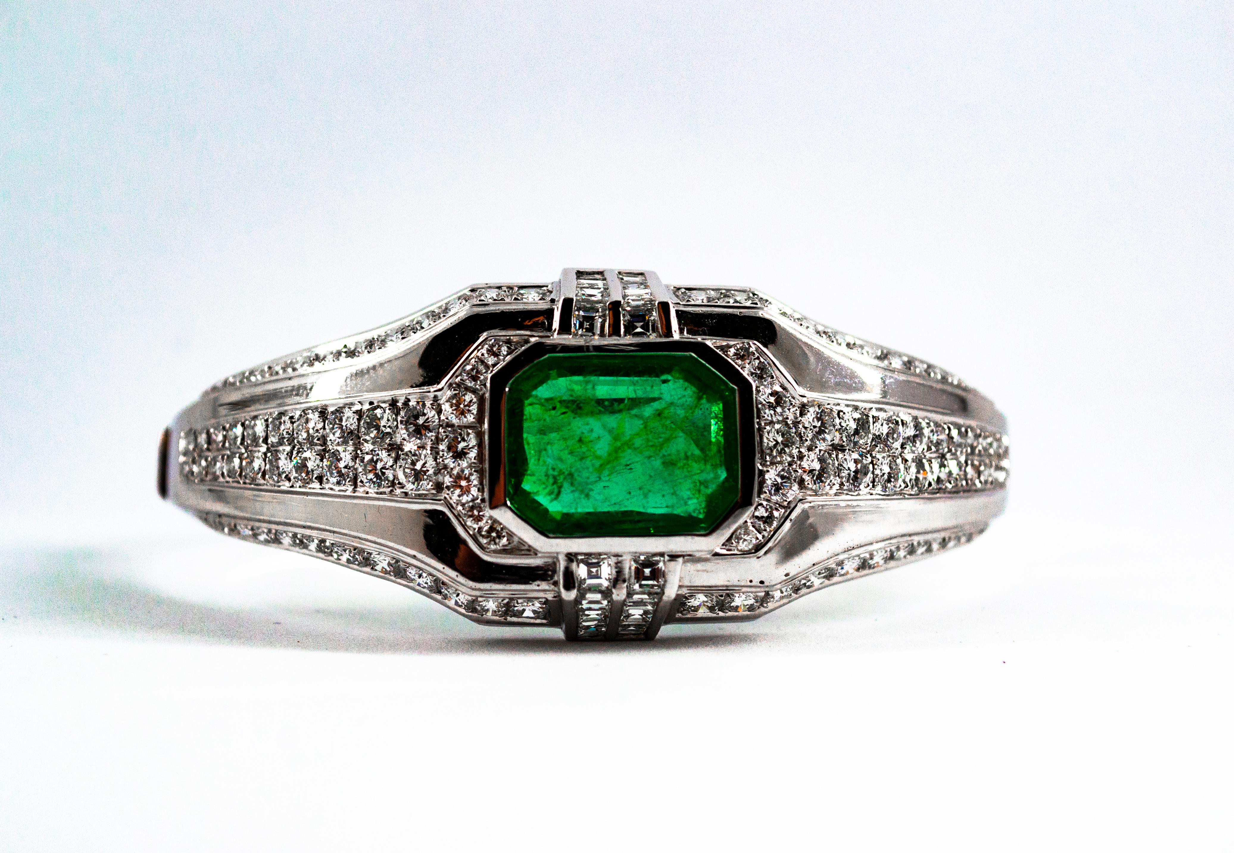 This Bracelet is made of 18K White Gold.
This Bracelet has 7.40 Carats of White Brilliant Cut and Princess Cut Diamonds.
This Bracelet has a 7.10 Carats Colombia Natural Emerald Cut Emerald.
This Bracelet is inspired by Art Deco.

We're a workshop