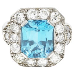 Art Deco 7.25 Carats Zircon Diamond Platinum Halo Gemstone Ring