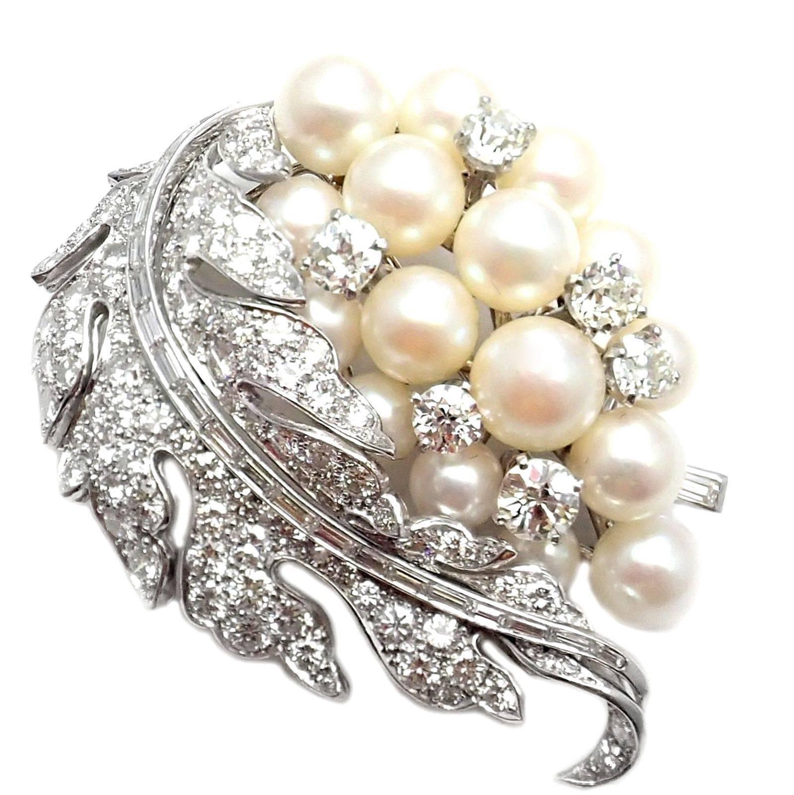 Estate Art Deco Platinum Diamond Pearl Pin Brooch
With 148 Total Diamonds, 7.5ctw
24 Emerald Cut Diamonds
124 Round Diamonds G Color/VS1 Clarity/Excellent Cut
15x Pearls Total Range 8.5mm to 6mm
Details:
Measurements: 41mm x 52mm
Weight: 32.6