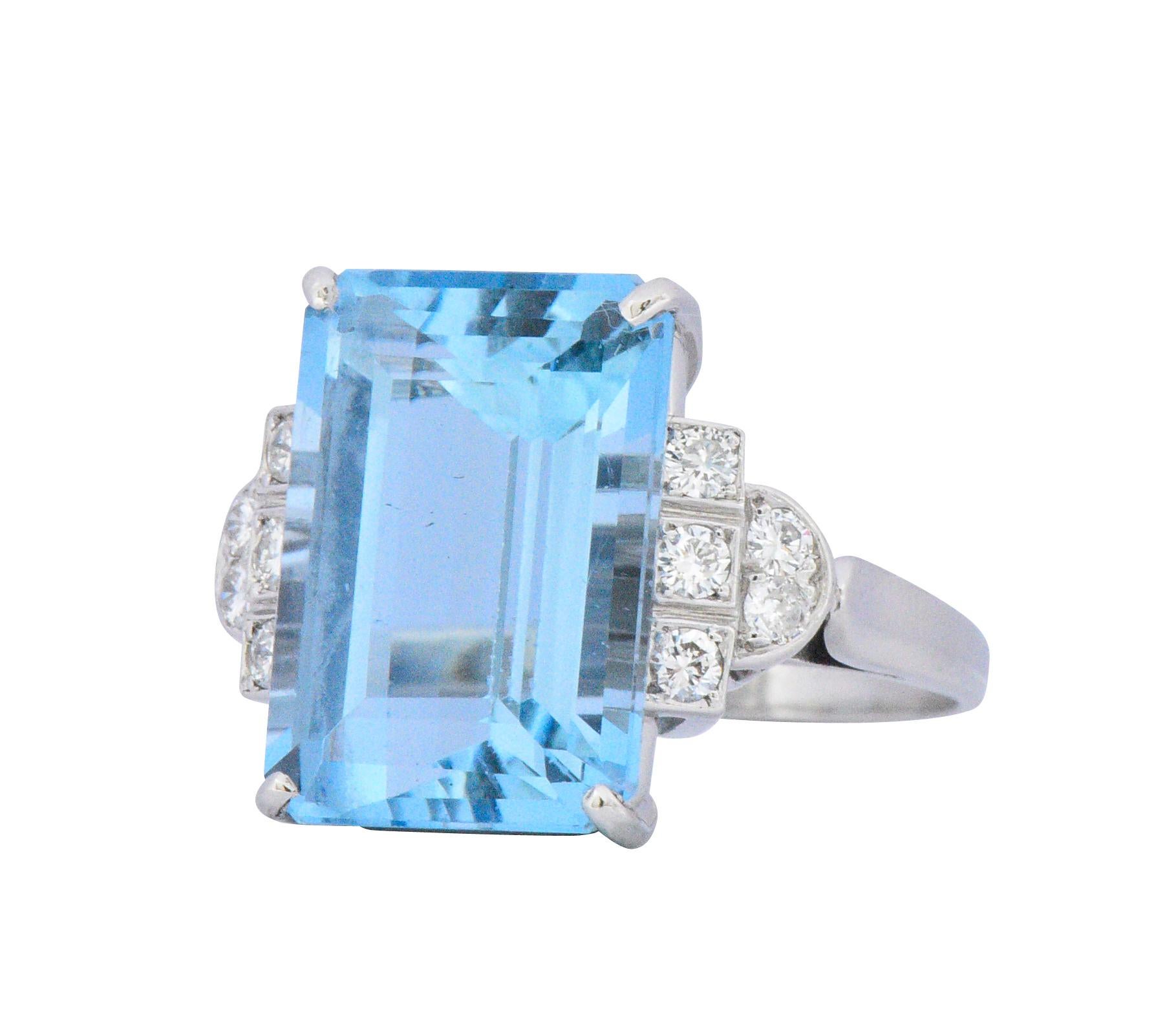 Centering a rectangular step cut aquamarine weighing approximately 7.55 carats, bright medium light blue

Flanked by round brilliant cut diamonds weighing approximately 0.20 carats total, G/H color and VS to I clarity

Tested as platinum

Circa