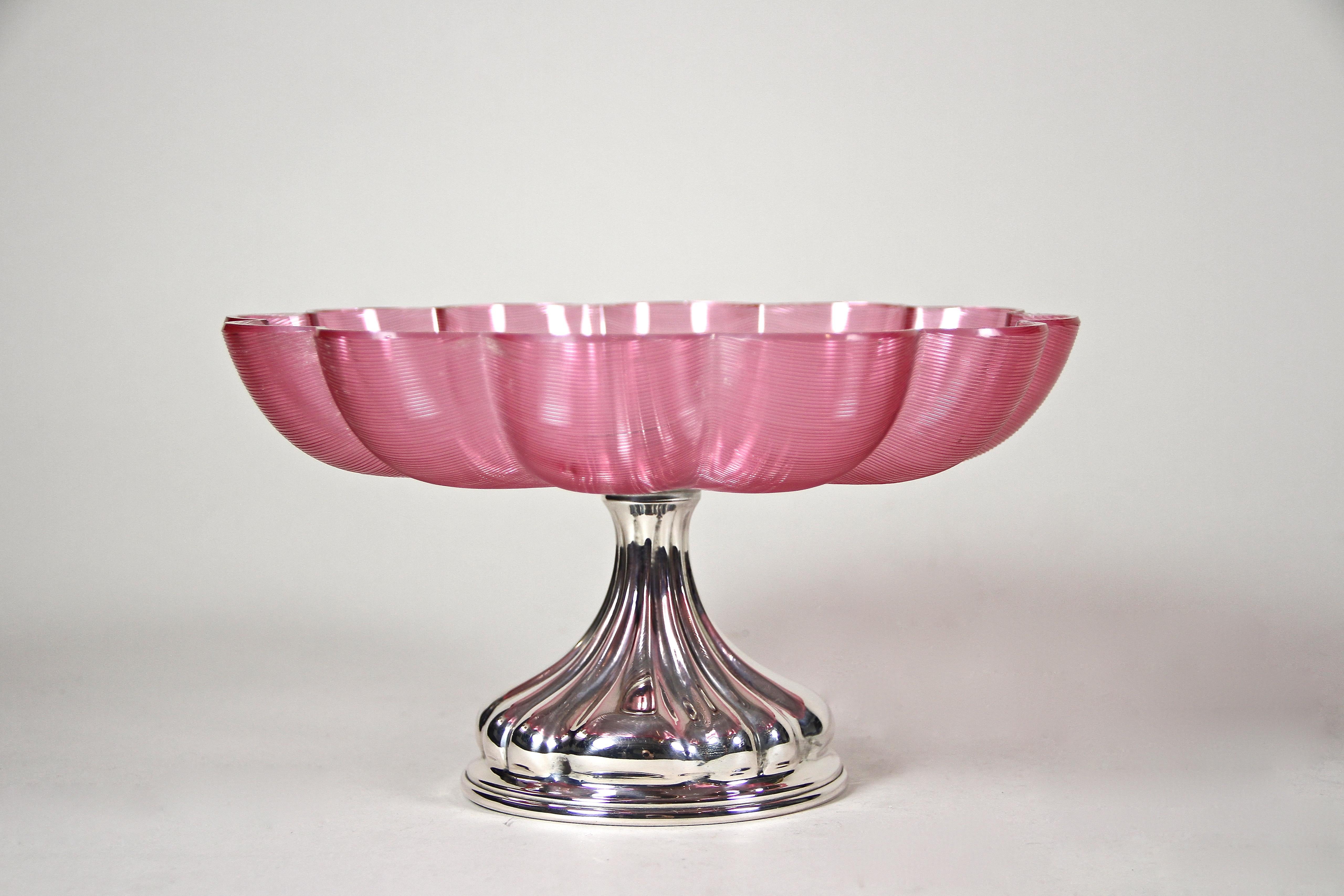 Charming Art Deco Silver Centerpiece with pink glass bowl from the period in Austria around 1920. The artfully shaped base, elaborately made of 800 silver, shows a beautiful organic design. The lovely flower-shaped bowl impresses with fine glass