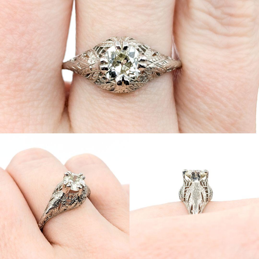 Romantic Art Deco .80ct Old Mine Cut Diamond Ring in Platinum

Introducing this stunning antique ring, meticulously crafted in platinum. This exquisite piece showcases a dazzling .80ct Old Mine cut diamond centerpiece, boasting SI clarity and a