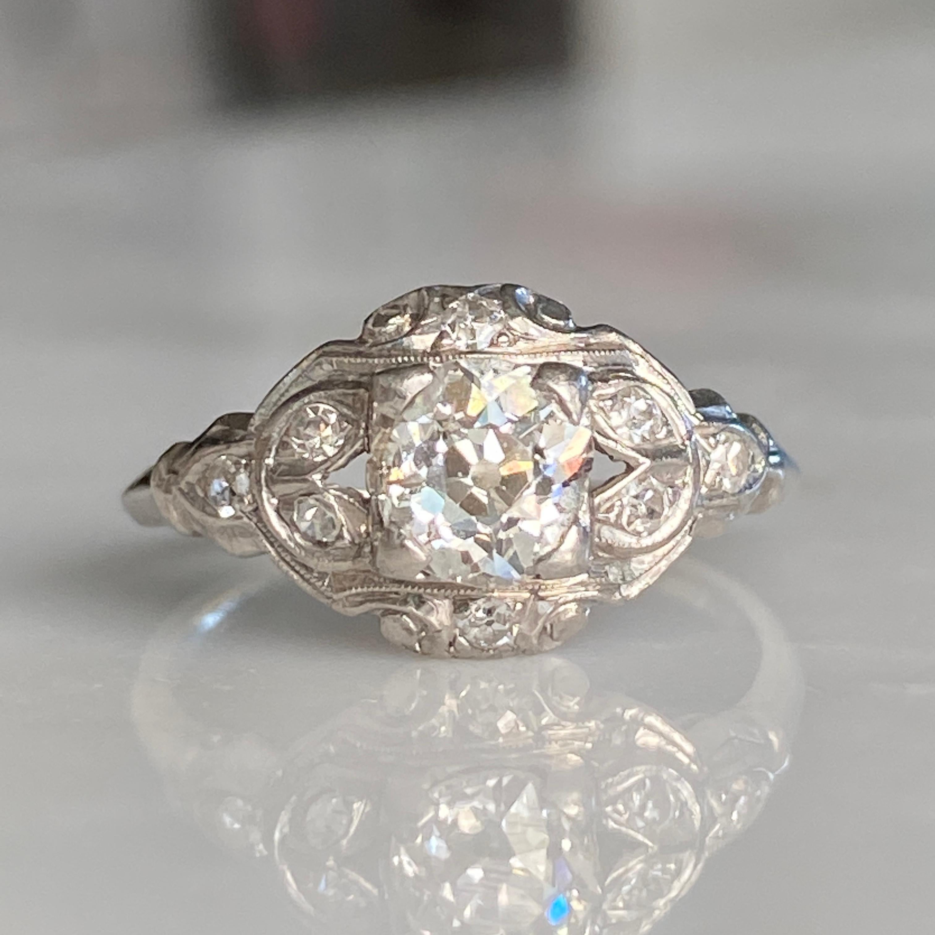 Details:
Sweet Art Deco Platinum .81ct Mine Cut Diamond engagement ring. This would make a lovely engagement ring! This ring comes with an appraisal. You will not be disappointed! Please ask all necessary questions prior to placing an