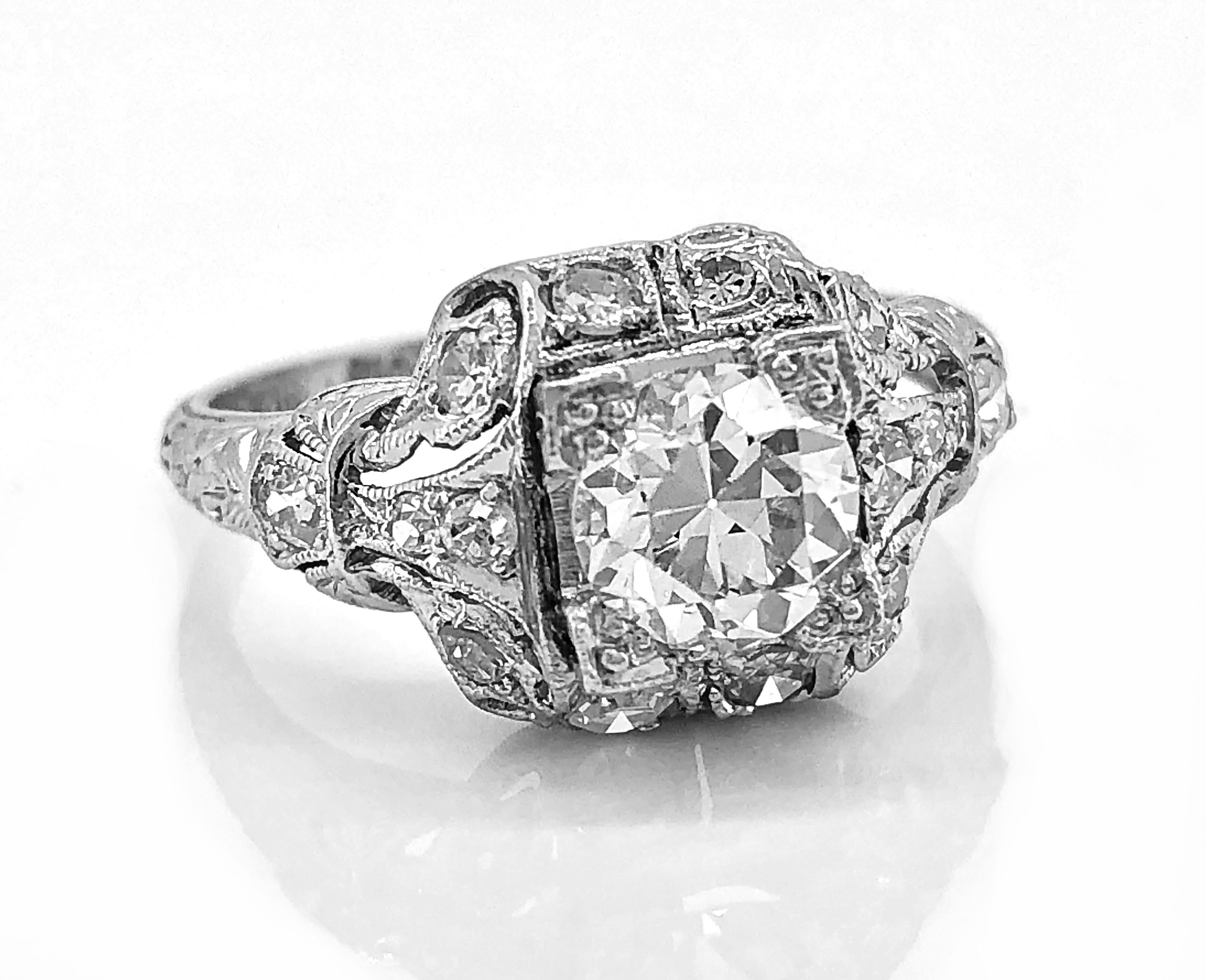 Another fantastic high quality antique engagement ring. It features an exceptional European cut center diamond with VS1 clarity and F-G color. This ring is artistically crafted and truly one-of-a-kind!

Primary Stone(s): Diamond - Conflict