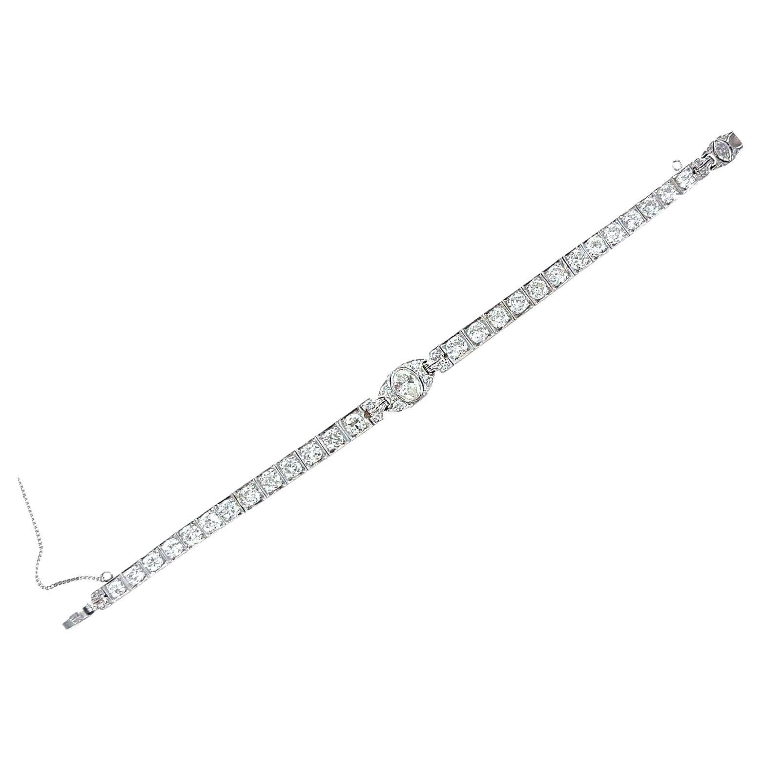 Art Deco 8.40 CTW Diamond Platinum Line Bracelet Oval Diamond Center For Sale