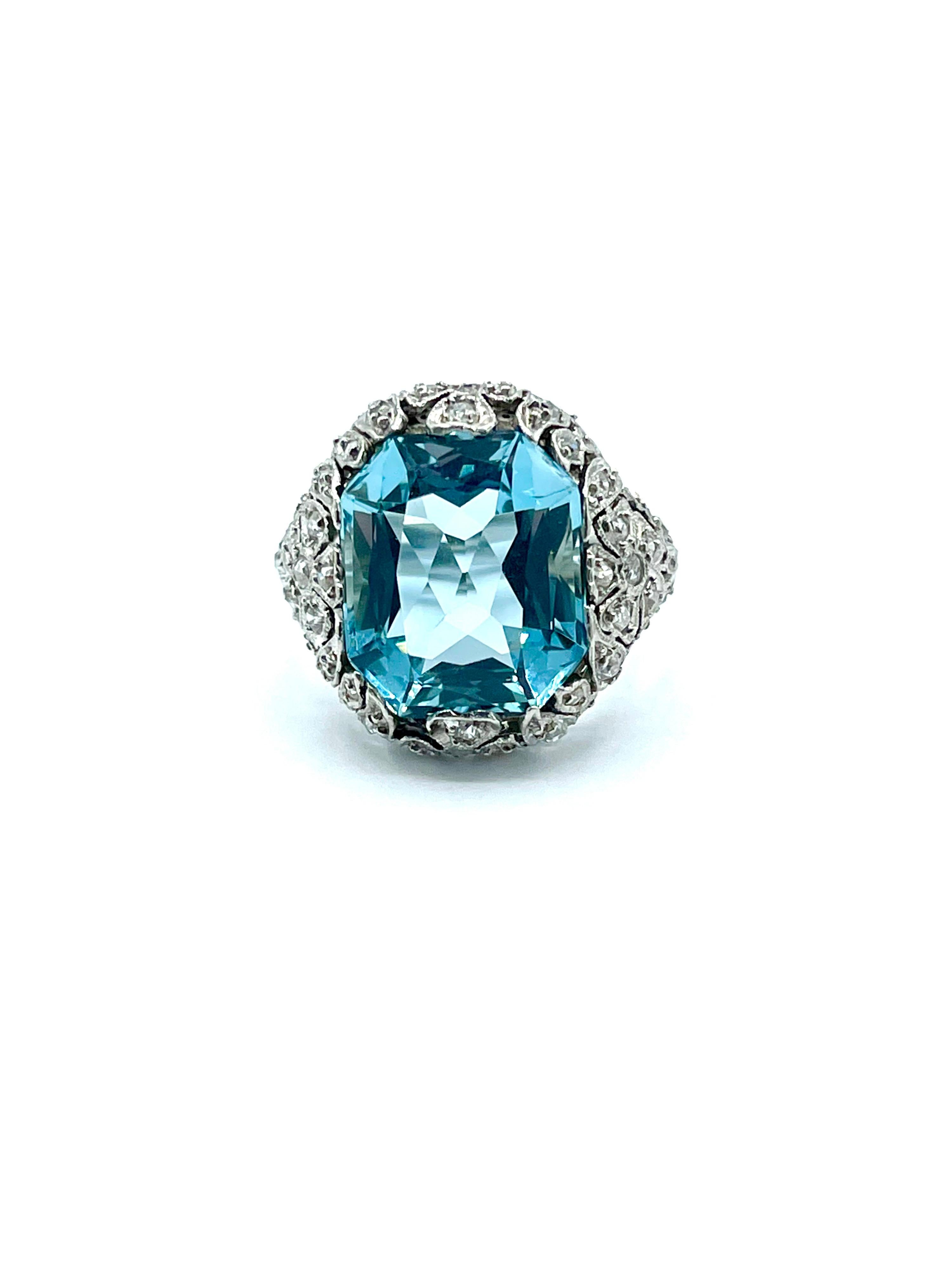 This is an absolute stunner!  The 8.95 carat Aquamarine displays great brilliance with a beautiful color and hue.  It is set in a platinum Diamond filigree mounting of the Art Deco era.  There is 1.00 carat total weight of Diamonds.  The ring is