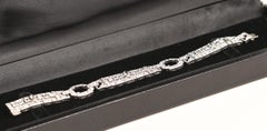 Art Deco 9 Carat Diamond Bracelet. Marquise Round Baguette Cut Platinum Bracelet
