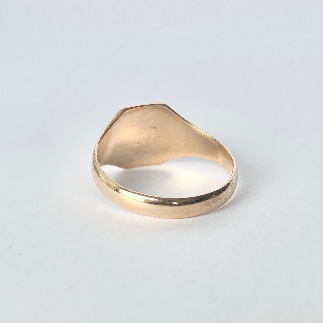 This sweet signet is modelled in 9ct gold and has a face with the initials 'GEJ' engraved into it.  Fully hallmarked London 1941.

Ring Size: W or 11
Face Dimensions: 11.5x11.5mm 

Weight: 4.9g