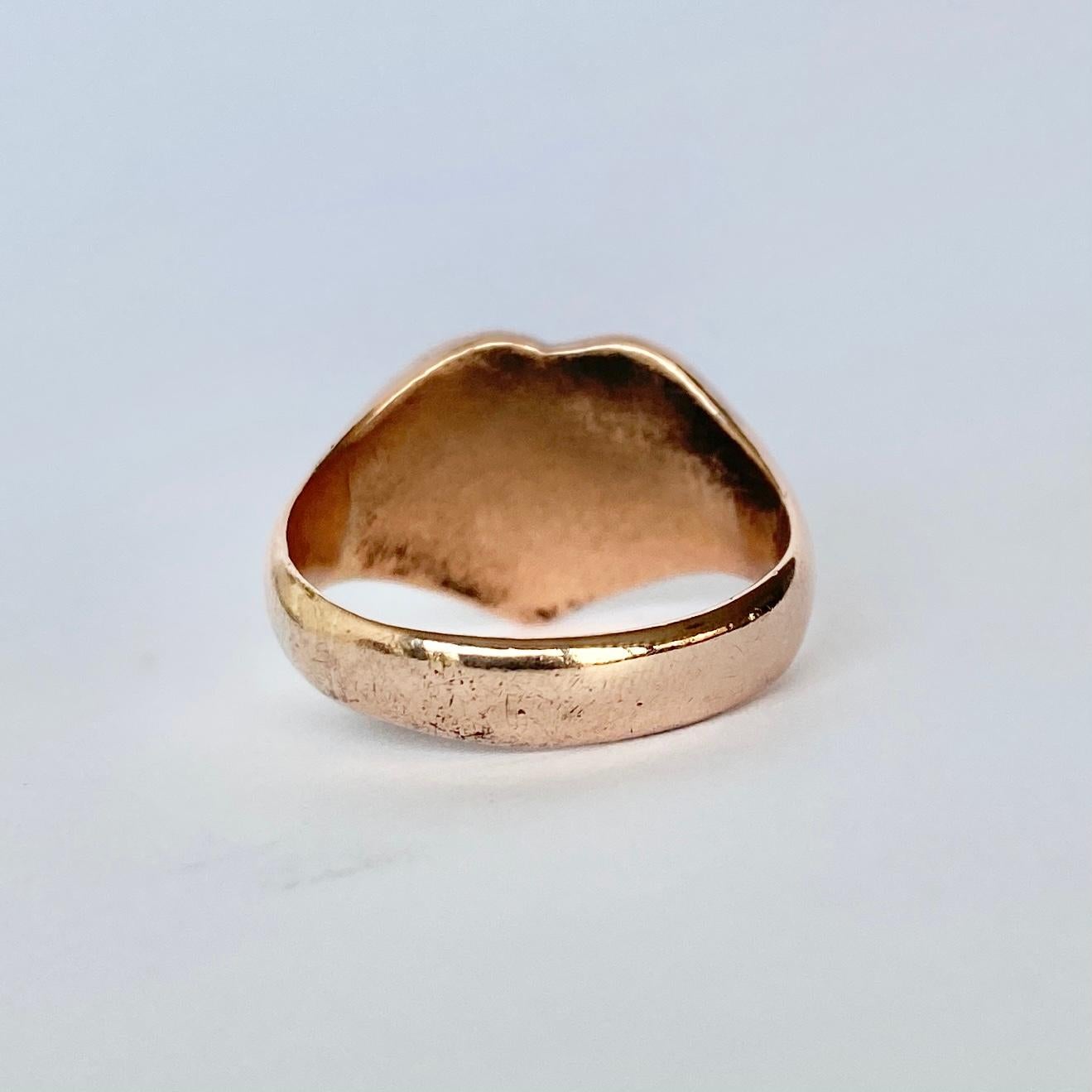 This chunky and gorgeous 9 carat rose gold signet has the initials ENL engraved on the front of it. Fully hallmarked Birmingham 1916.

Ring size: N 1/2 or 7 
Widest Point: 12.5mm

Weight: 6.3g