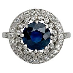 Art Deco 900 Platinum 1.80 Carat VS Sapphire 0.28 Carat Diamond Cluster Ring