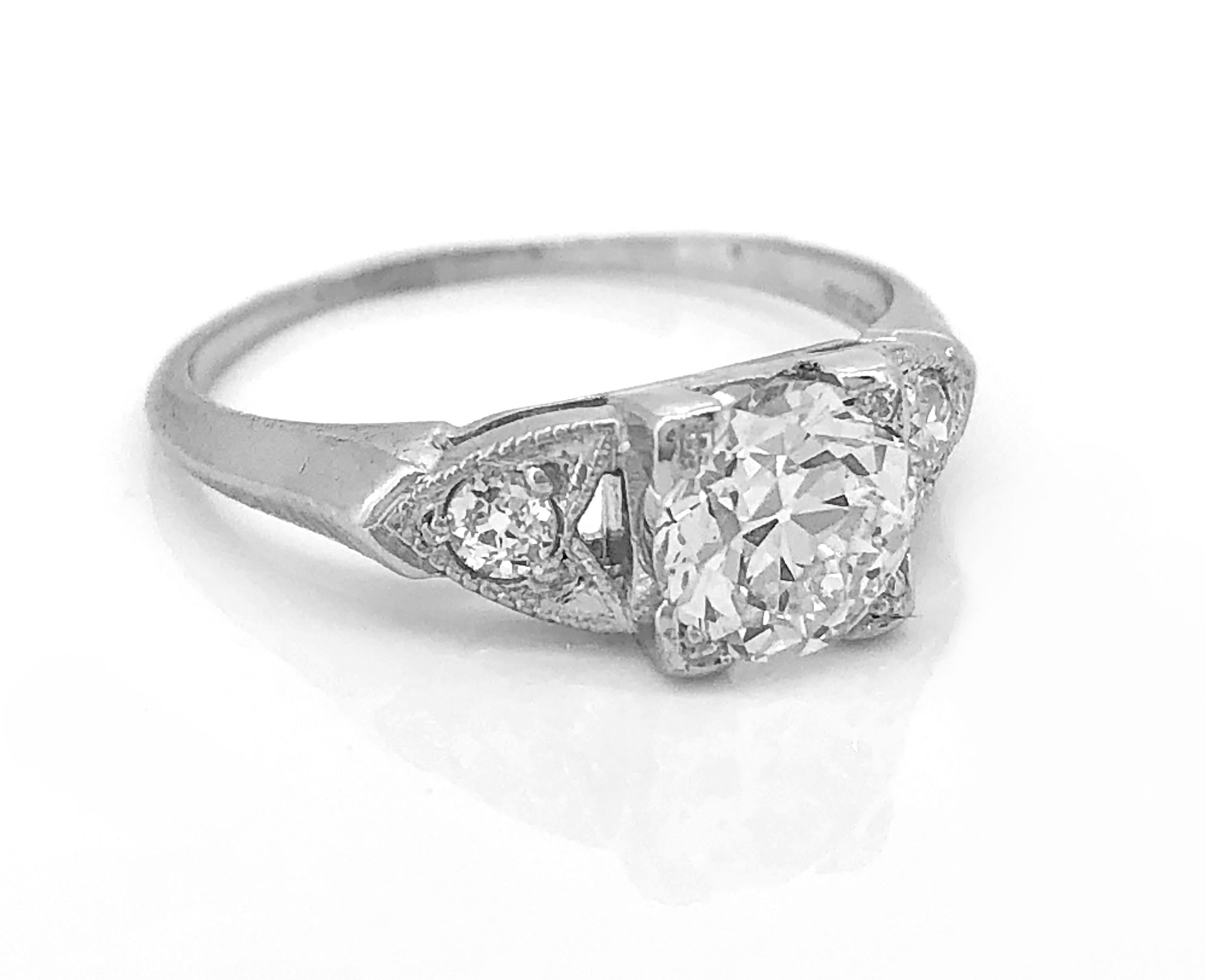 A sophisticated and timeless Art Deco .92ct. diamond Antique Engagement Ring features a European cut center stone with I1 clarity (eye clean) and bright white G color. The accenting European cut diamonds weigh .12ct. apx. T.W. with VS2-SI1 clarity