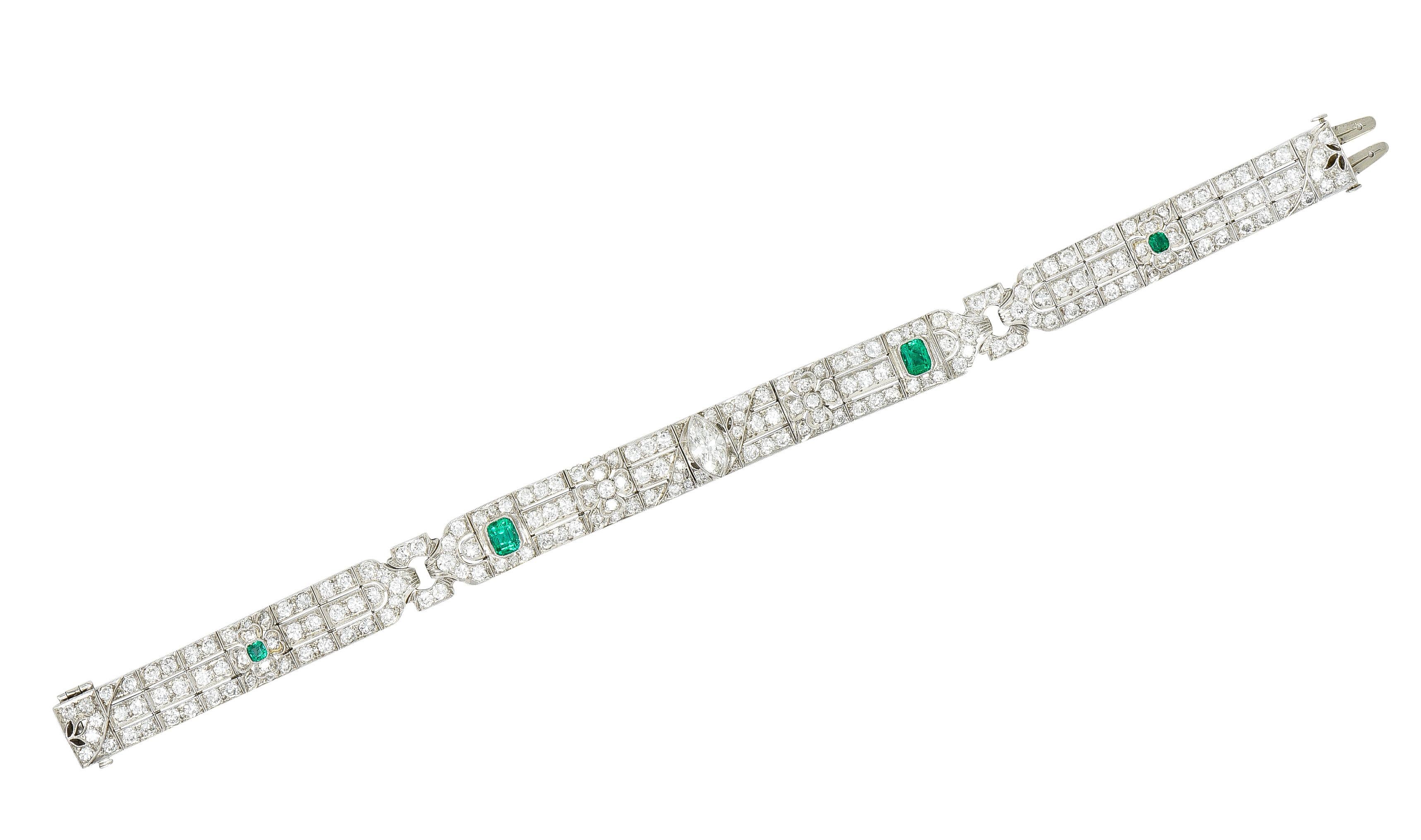 Bracelet is comprised of hinged links with clover and ribbon motifs - centering a marquise cut diamond. Bezel set and weighing approximately 0.85 carat total - I color with VS1 clarity. Accented by old European cut diamonds bead set throughout.