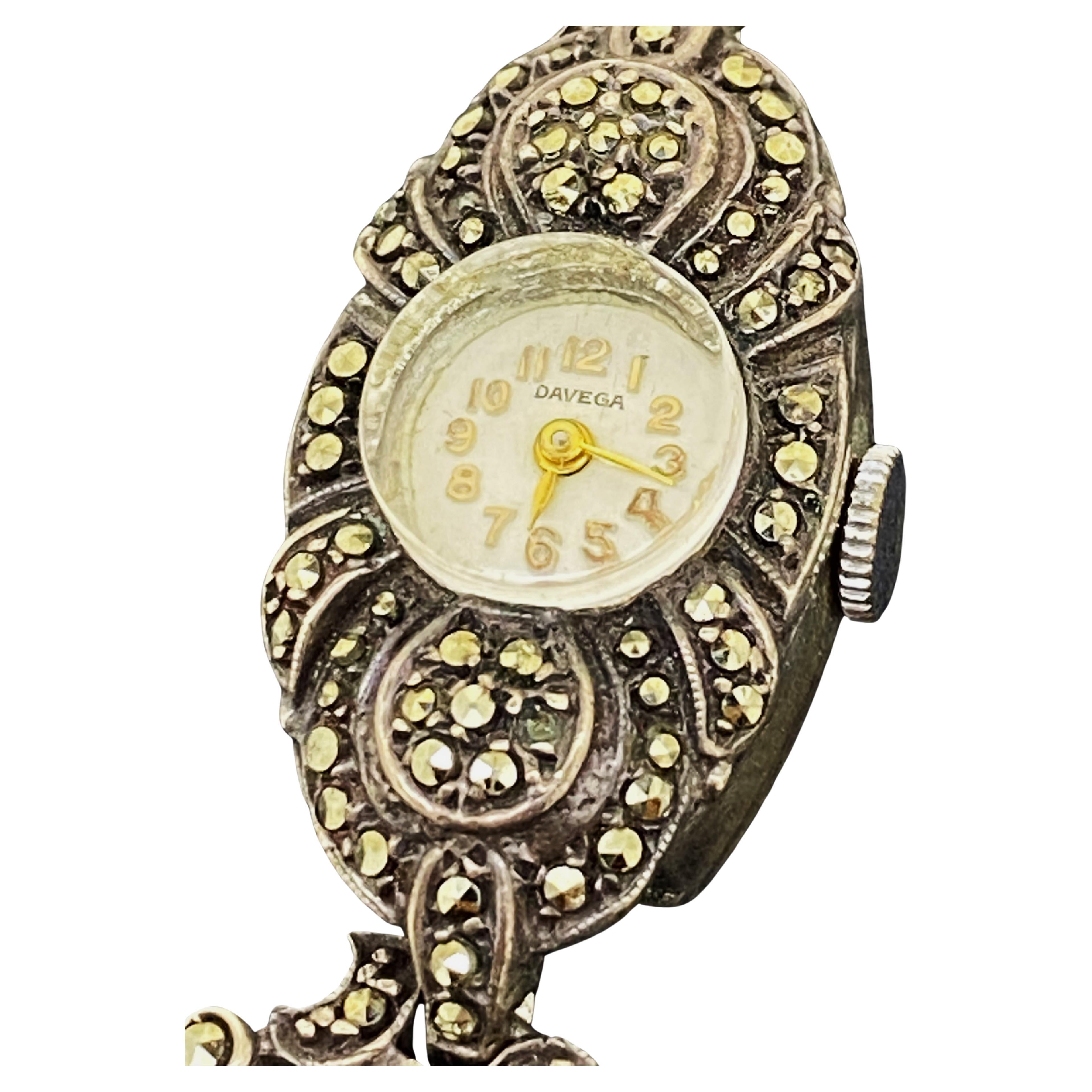This delightful ladies' cocktail watch was made by 
Swiss brand Davega;
it's from Art-Deco period, 
yet it's in beautiful vintage condition & 
in excellent working order.

It features: 

Lavishly decorated with marcasites
desirable & rarely seen