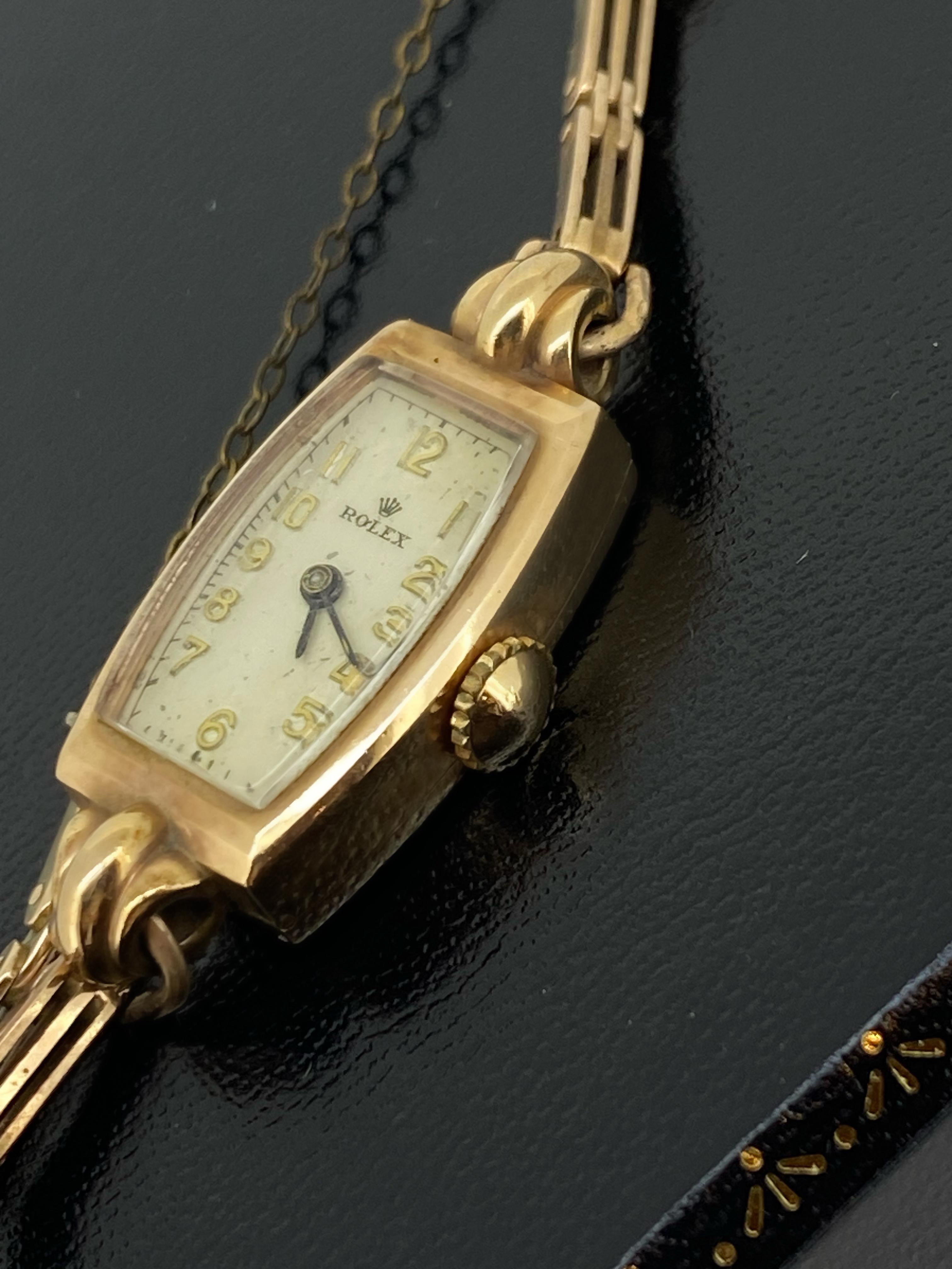 This Fine Rolex ladies' dress watch is 
from Art-Deco period, 
yet it's in beautiful vintage condition & 
in excellent working order.

It features: 

9K Rose Gold Unusual Barrel Case,
with fancy lugs, 
measuring 33m (from lug to lug) x 
15mm (not