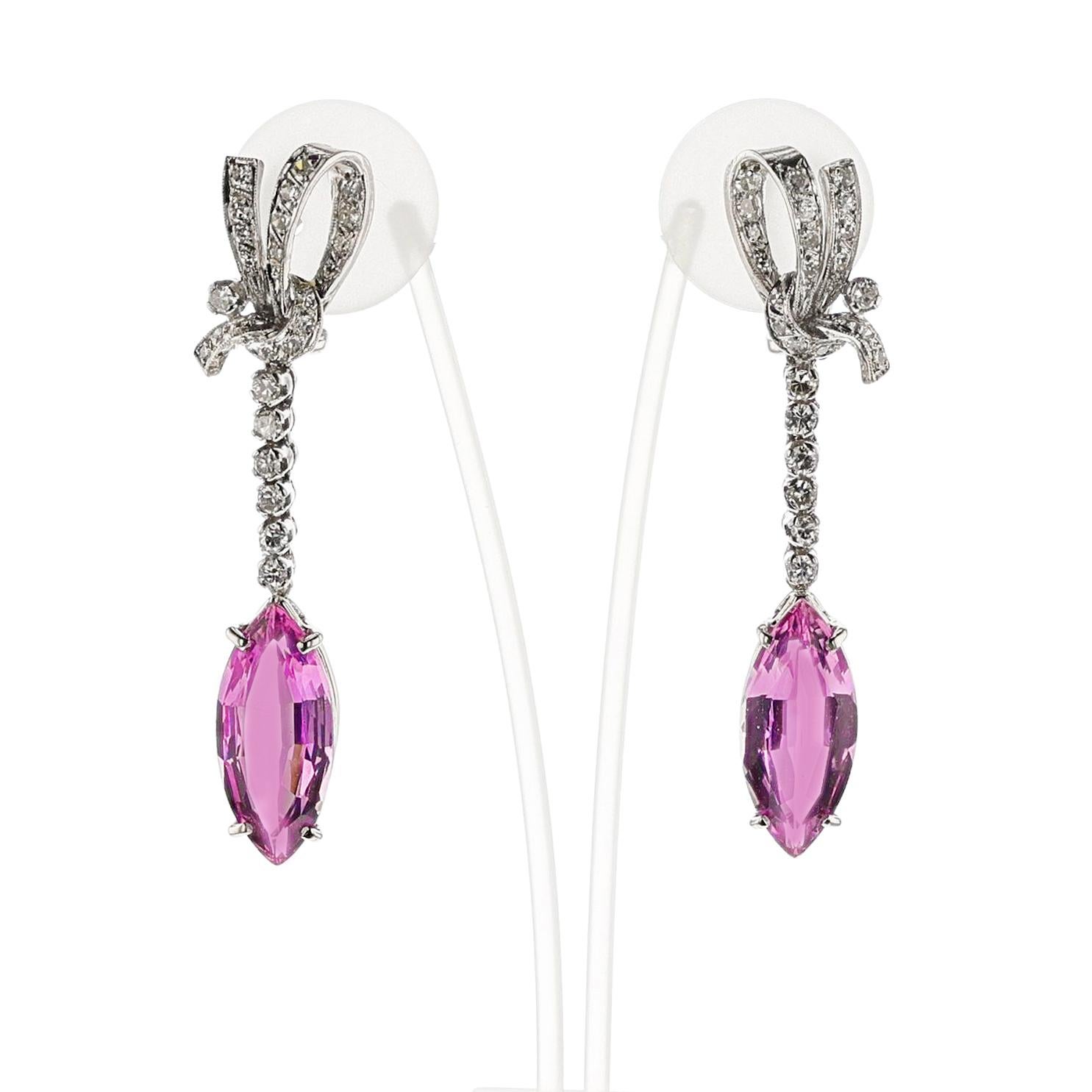 A pair of Art Deco AGL Certified Natural Marquise Pink Topaz and Diamond Earrings made in Platinum. The diamonds are single cut. The Natural Pink Topaz pair weighs 5.64 carats and 5.53 carats. Diamond weight approx. 3.00 carats. Earrings Length 2.10