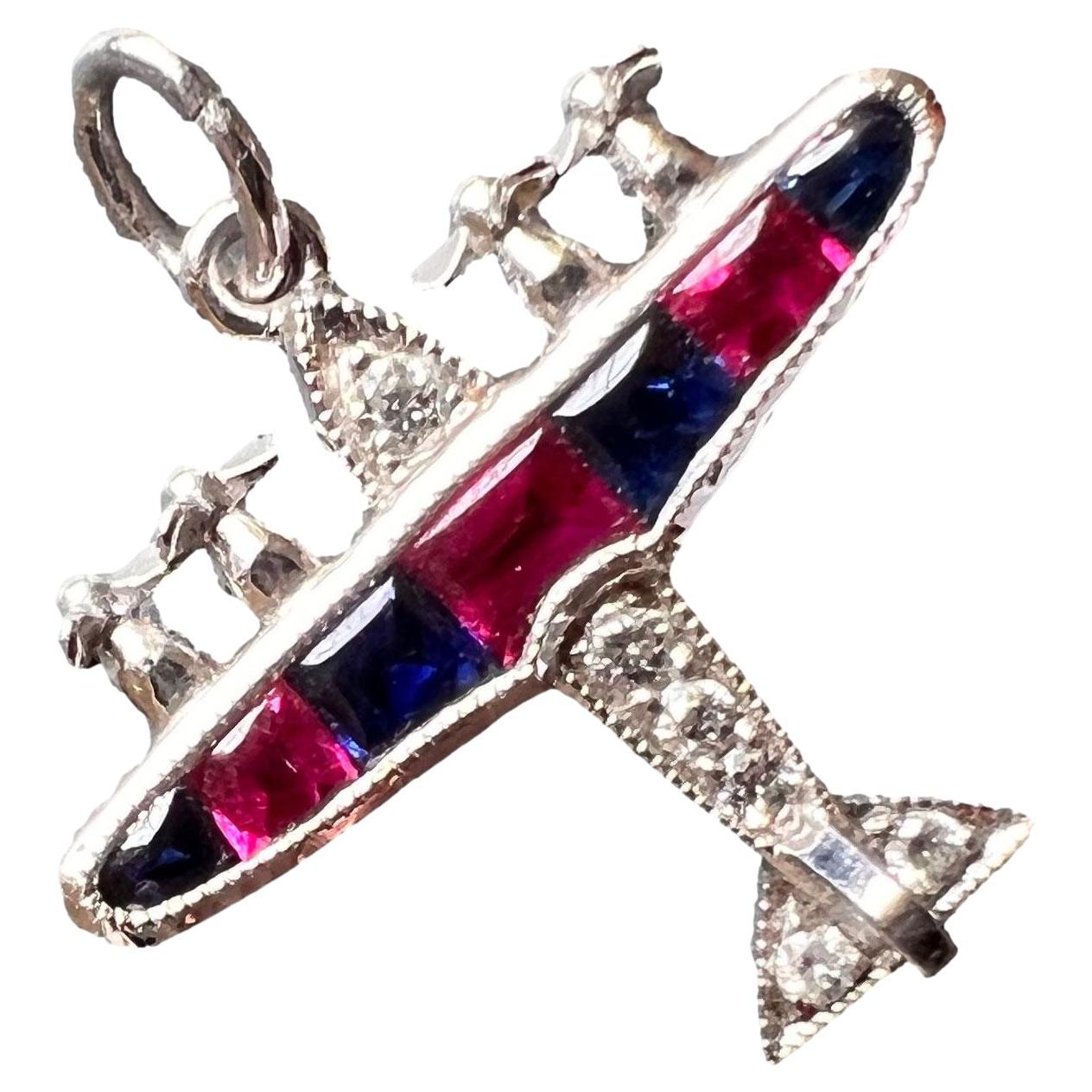 Art Deco Airplane Platinum Diamond Sapphire Ruby Charm Pendant For Sale